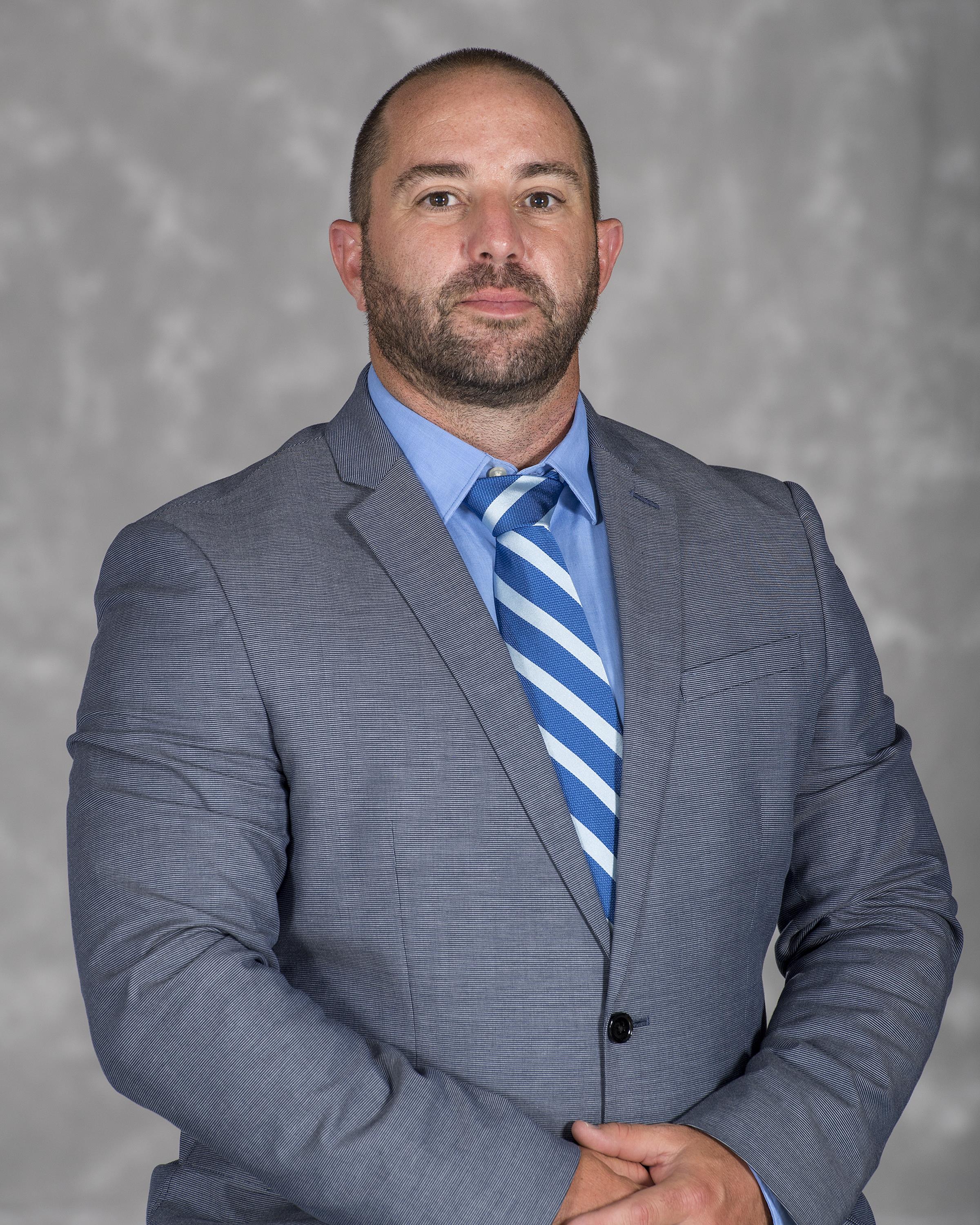 Headshot image of women's cross country/track & field coach Chuck Williams
