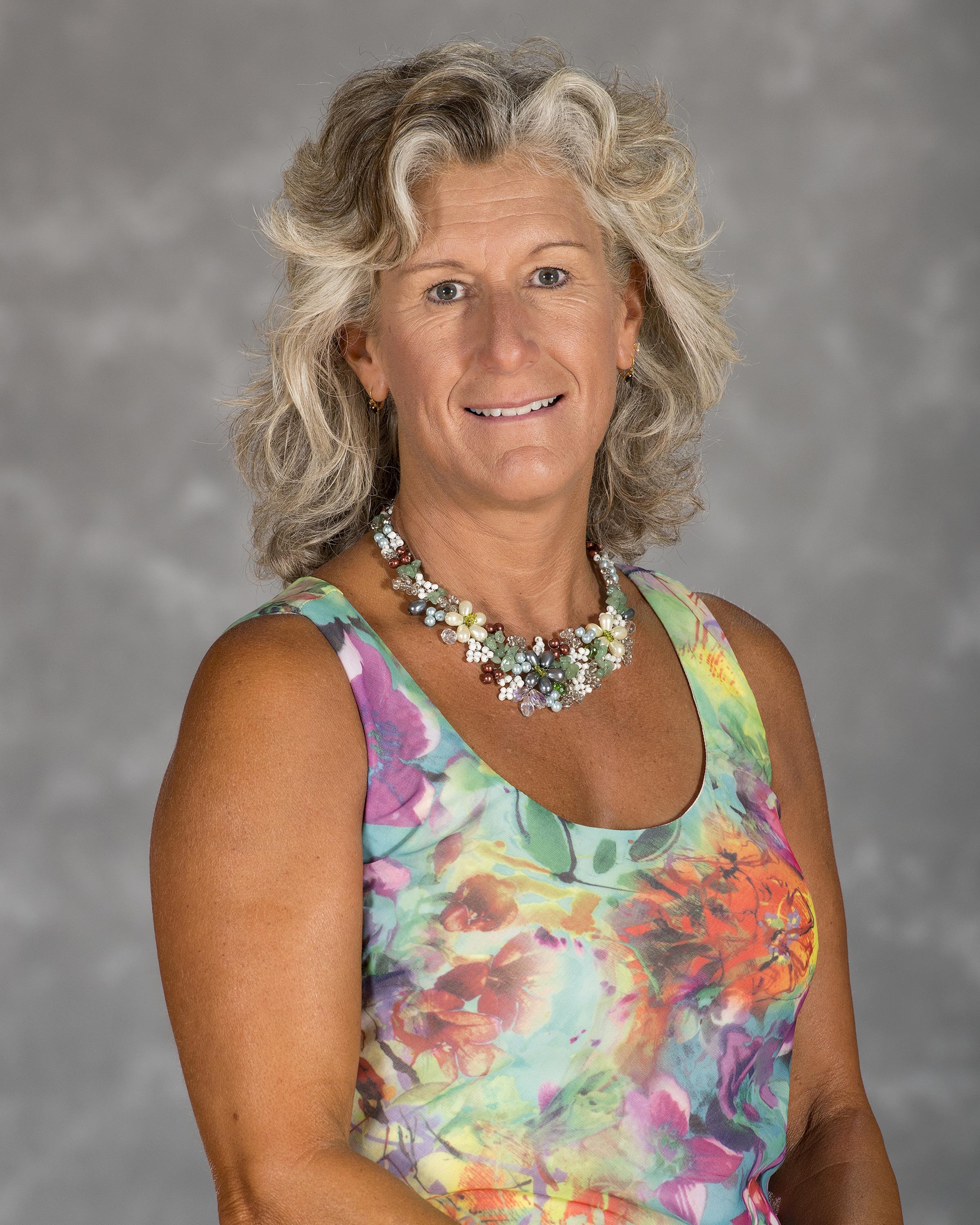 Headshot image of women's swimming & diving associate head coach Melanie Bolstad