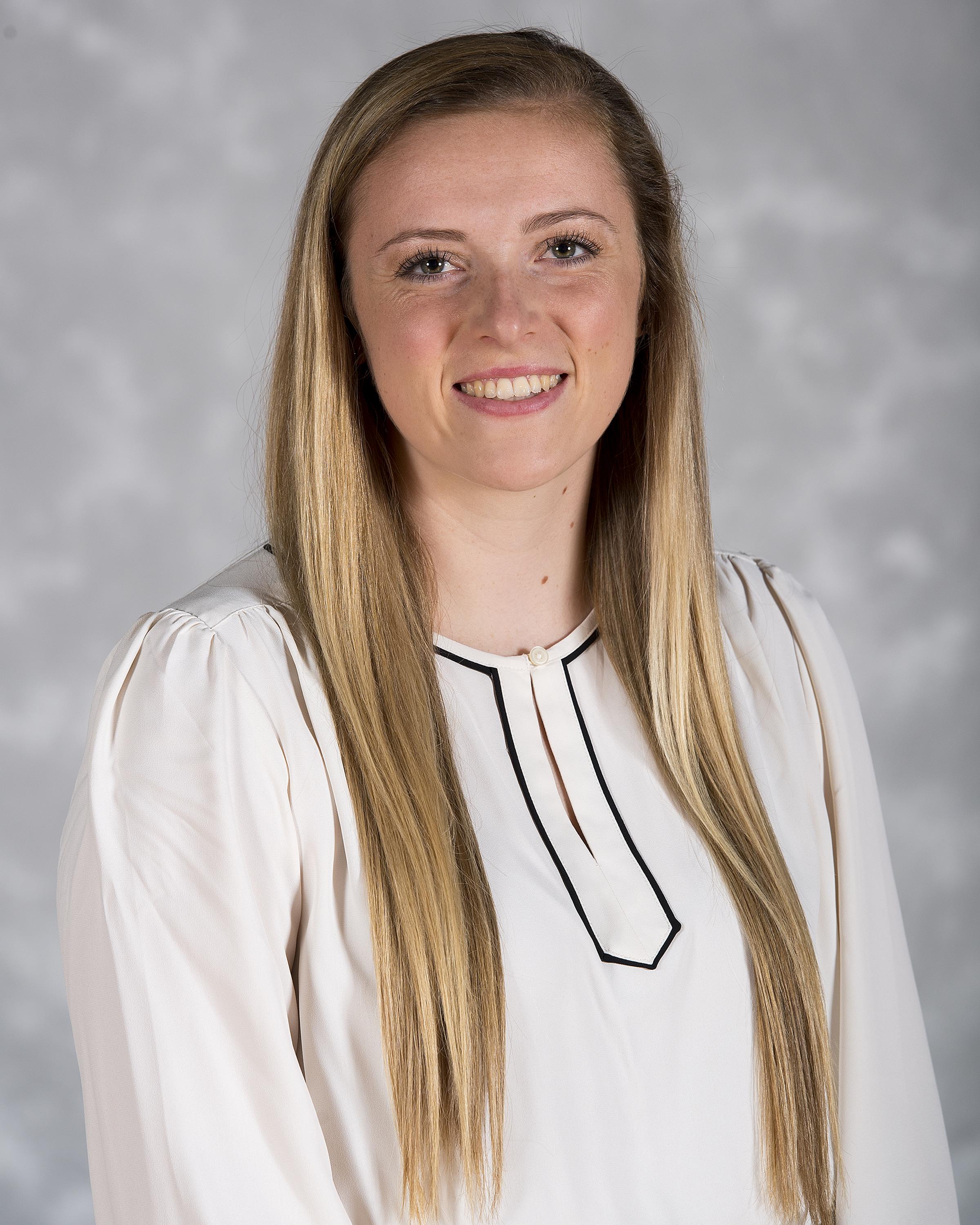 Head shot image of women's basketball student-athlete Maggie Gallagher