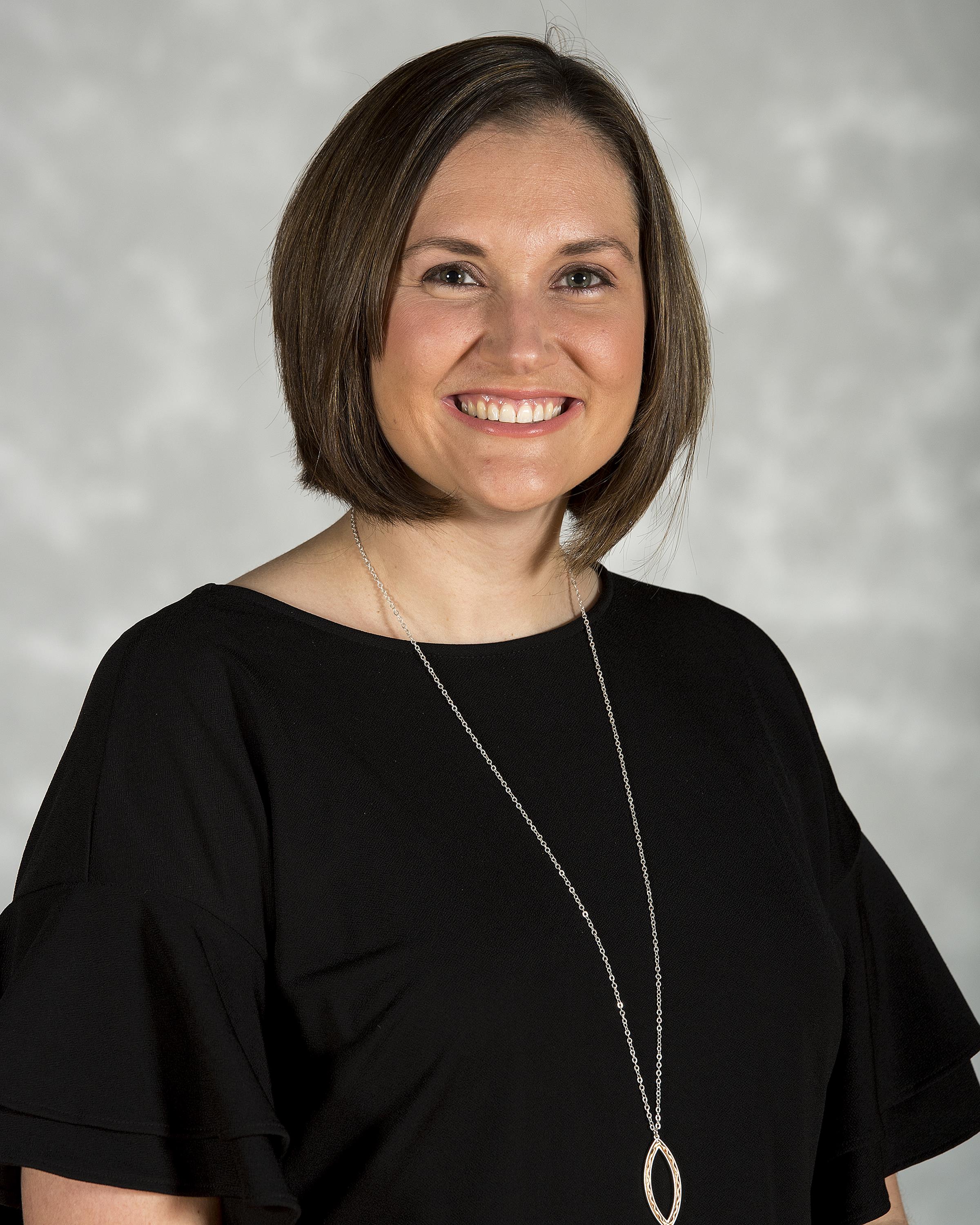 Head shot image of women's basketball student-athlete Erin Doughty