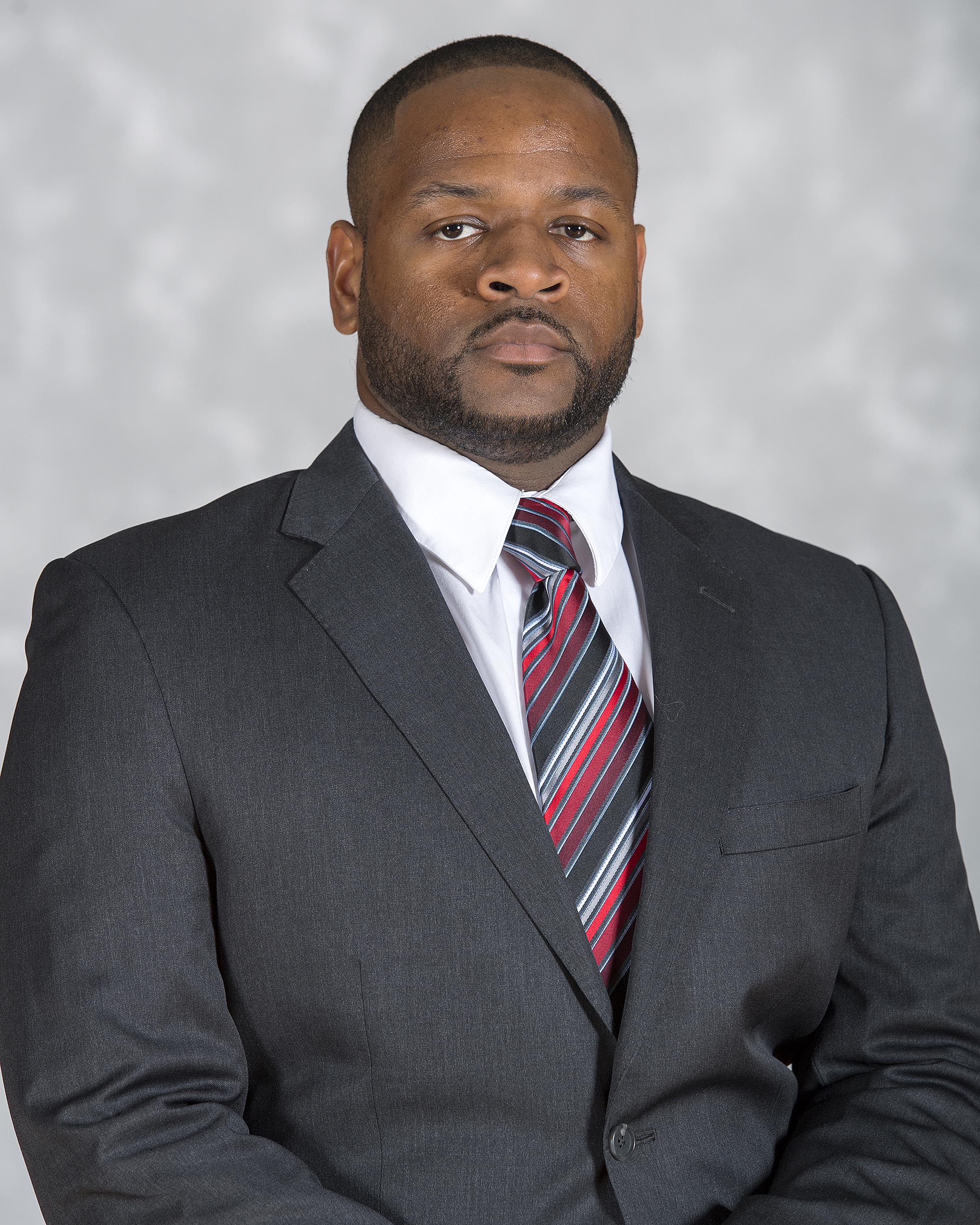 Head shot image of men's basketball director of operations Dorian Long