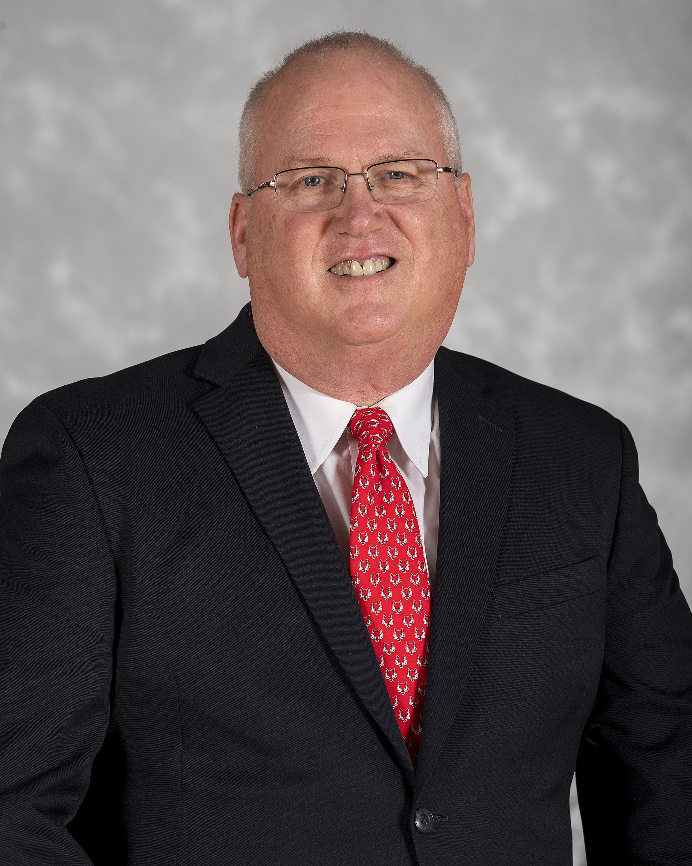 Head shot image of women's basketball Coach Brian Giorgis