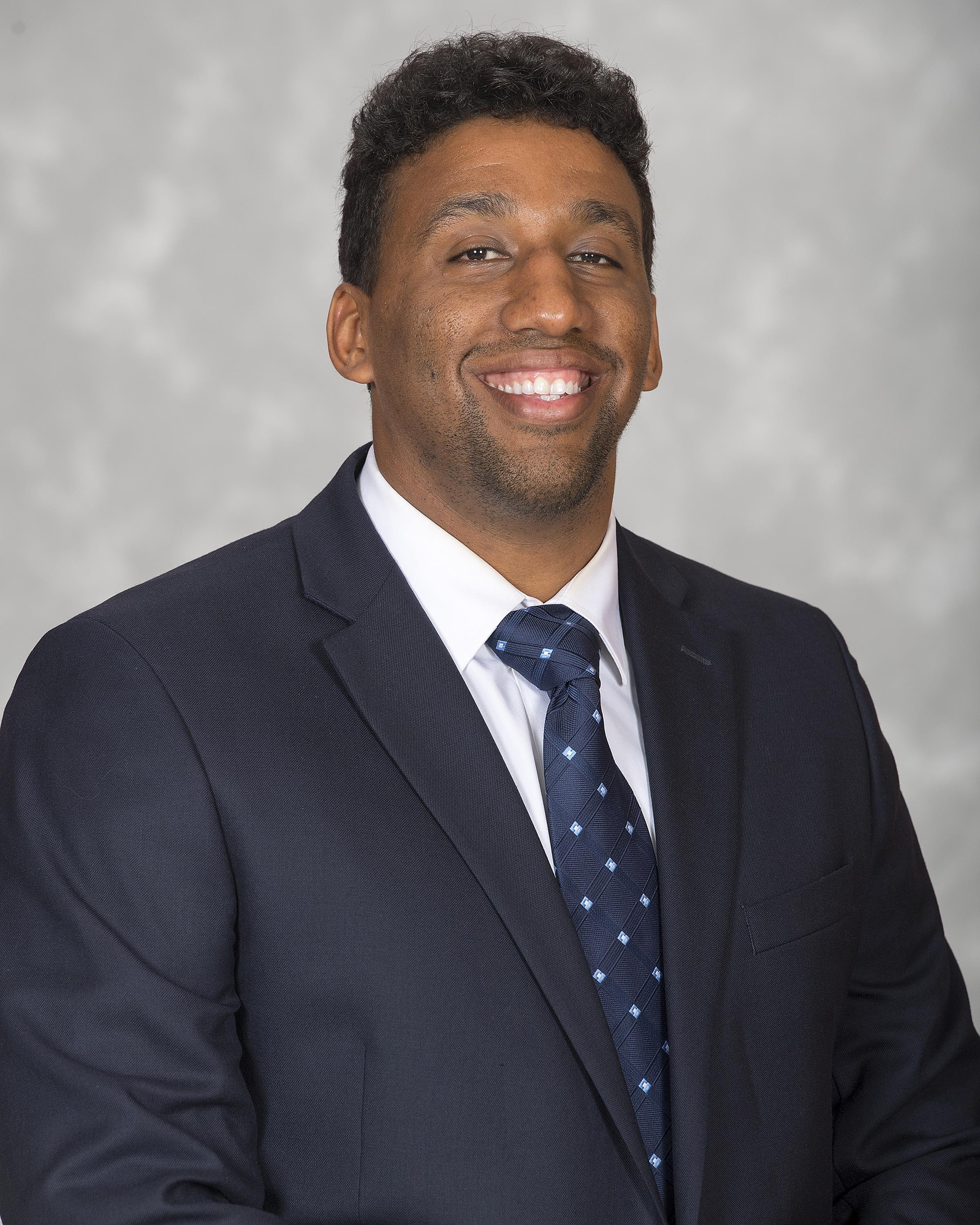 Headshot image of women's water polo coach Chris Vidale