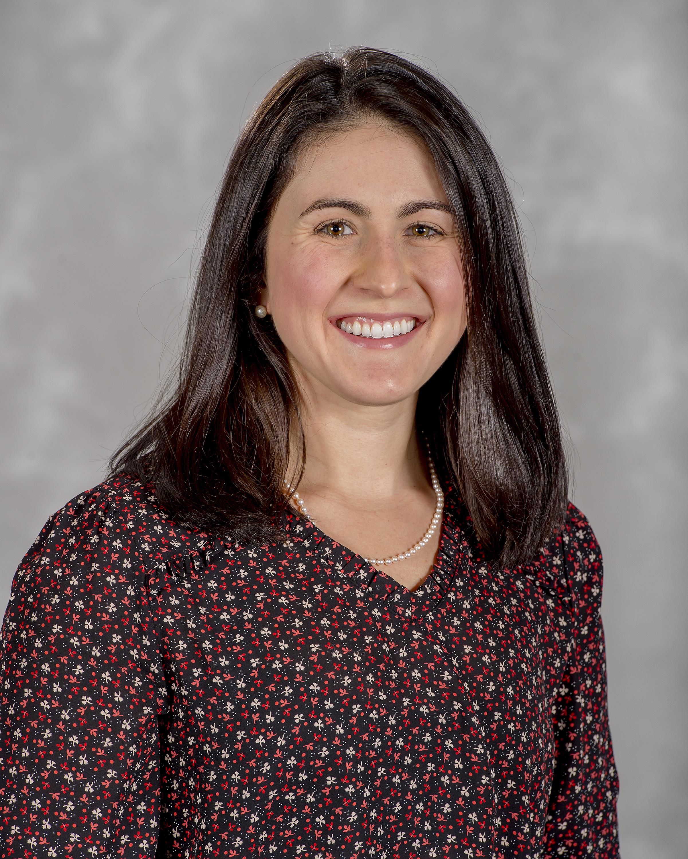 Head shot image of women's rowing assistant coach Julia Rigothi