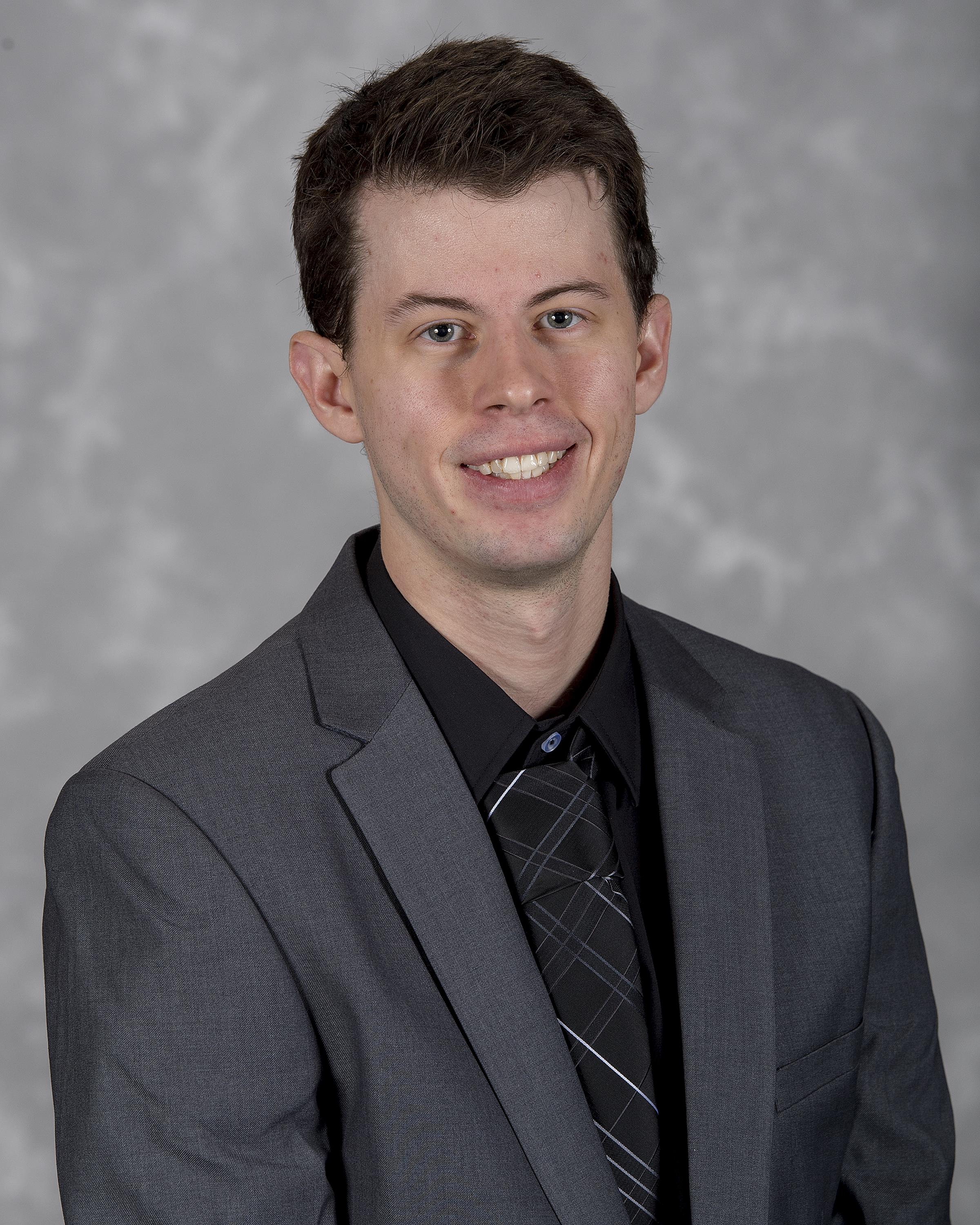 Head shot image of men's & women's tennis assistant coach Braden Baker