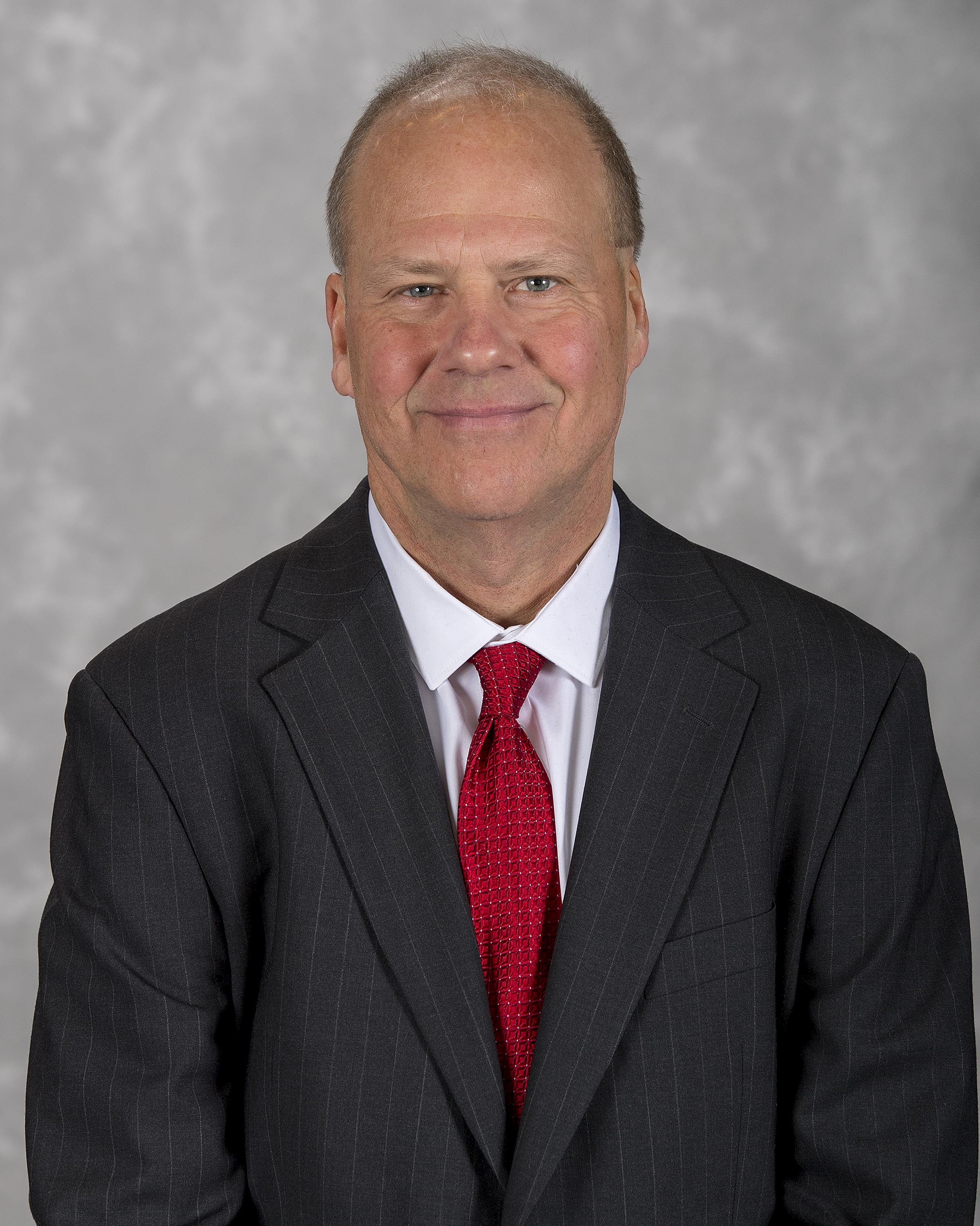 Head shot image of volunteer assistant tennis coach Paul Krupin