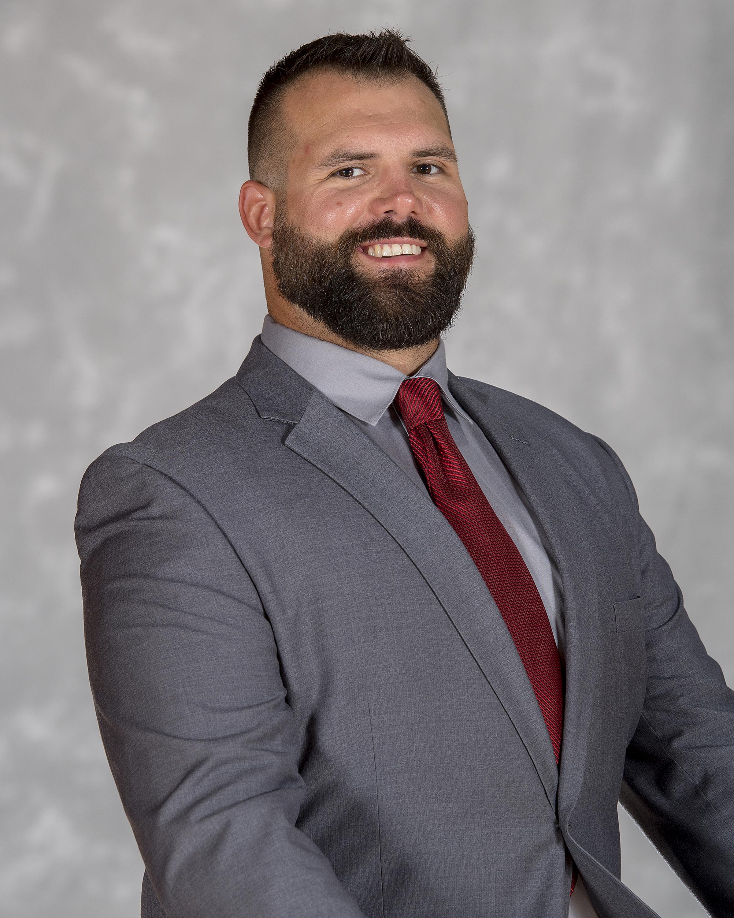 Headshot of Jake Dembow Football Coach