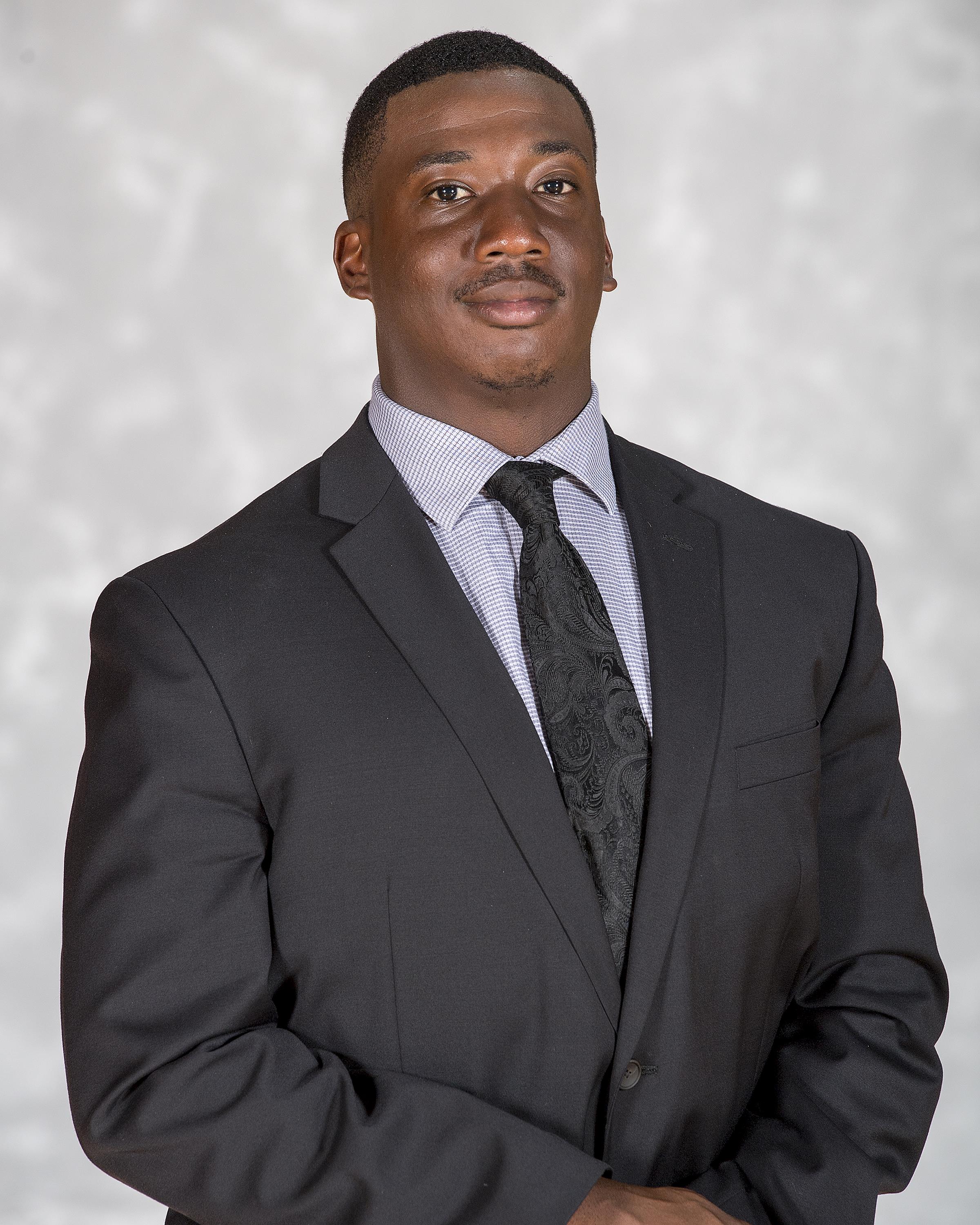 head shot of coach Isaiah Watson