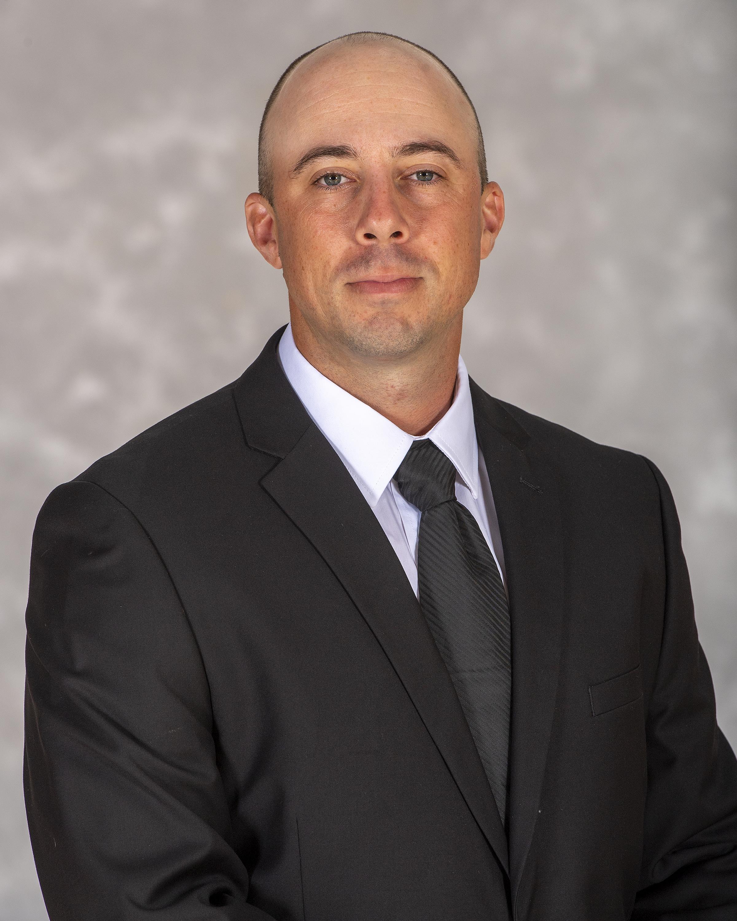head shot of assistant football coach Billy Creed