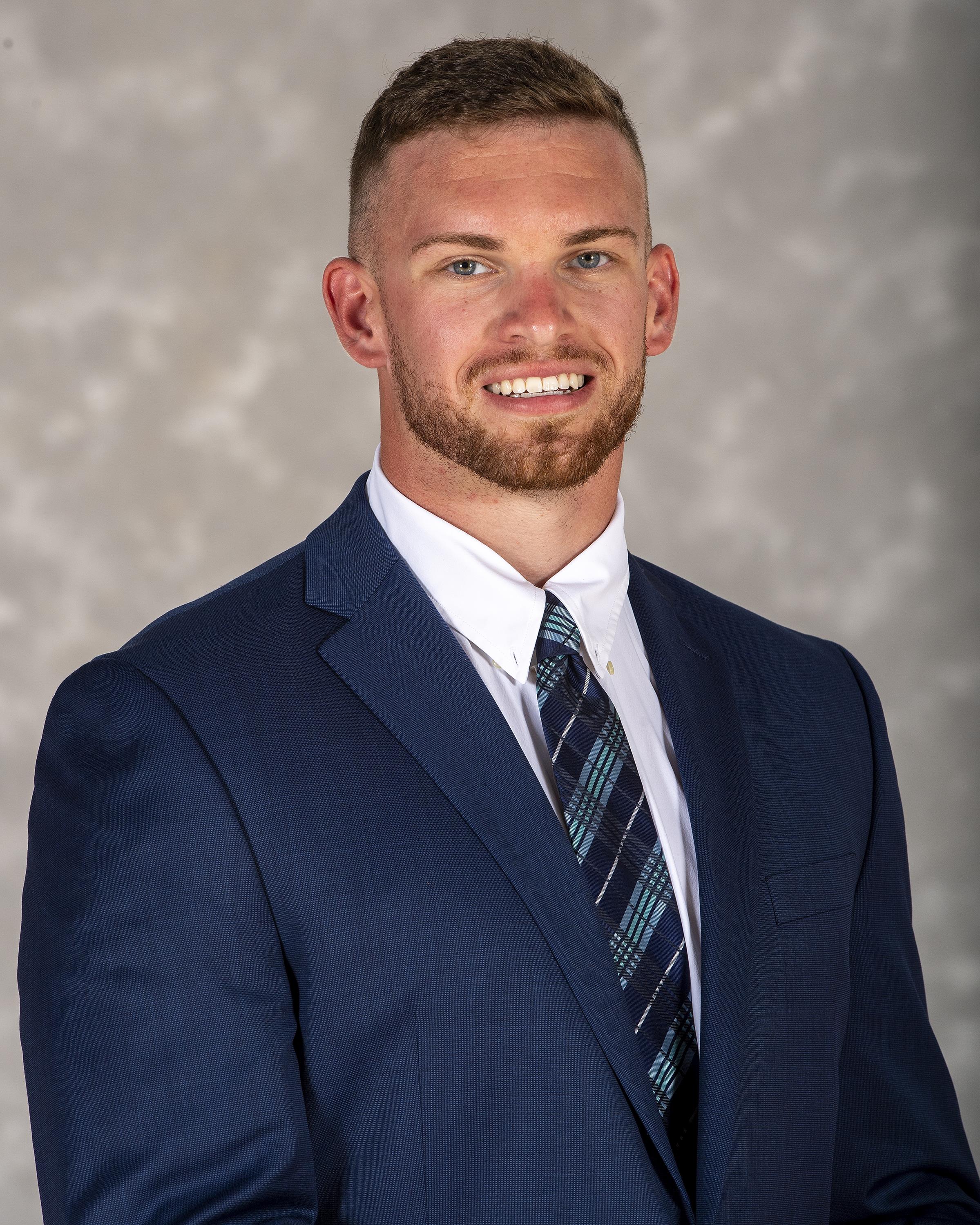 head shot of assistant football coach Luke Butera