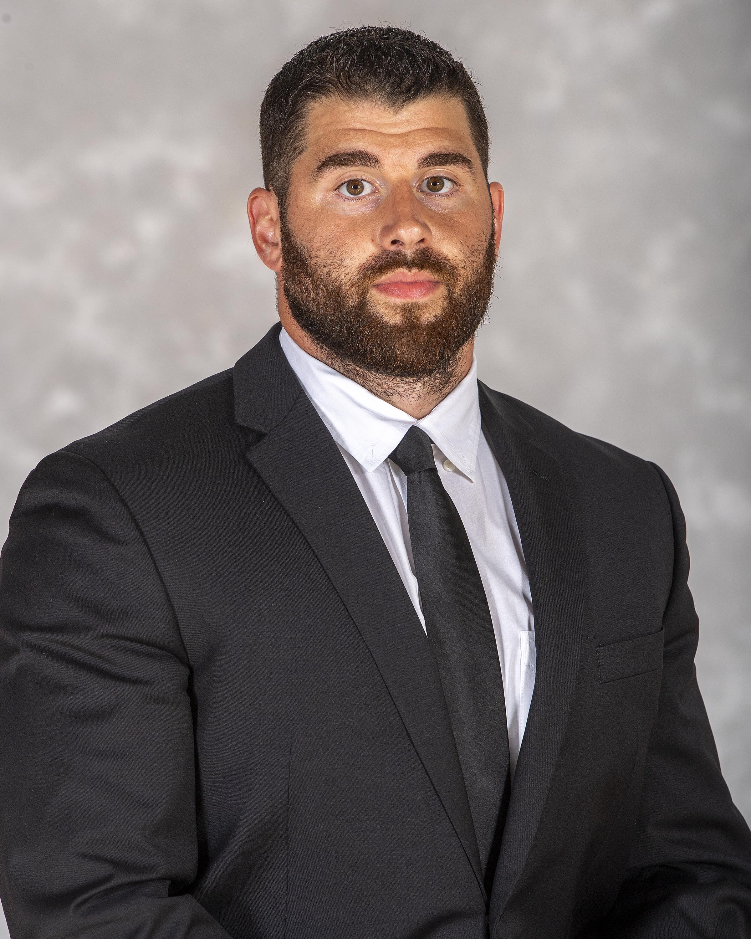 head shot of assistant football coach Mike Kagafas