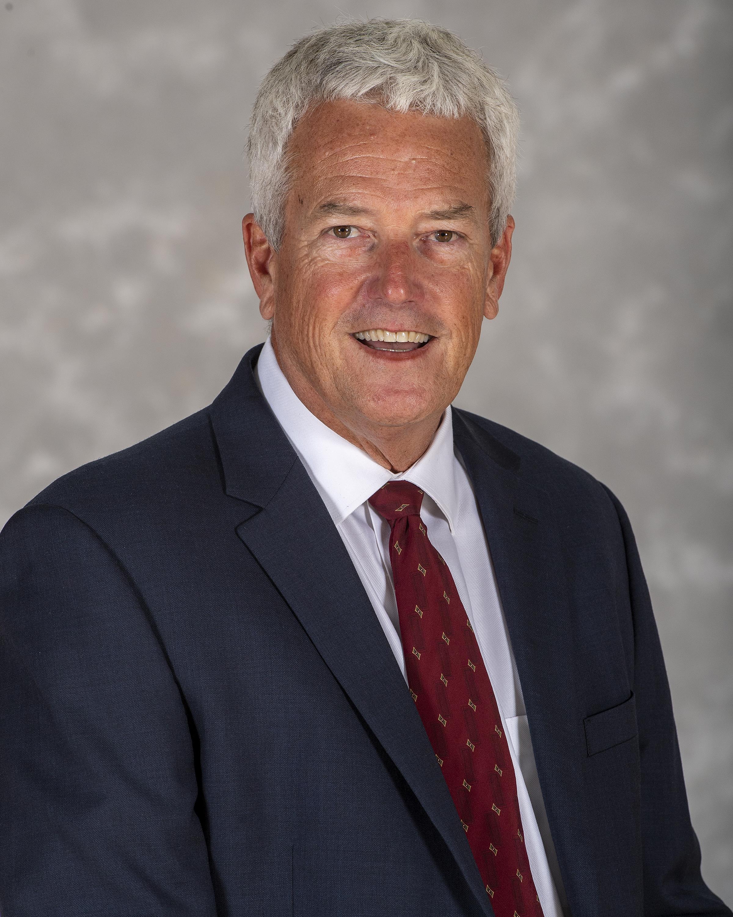 head shot of head football coach Jim Parady
