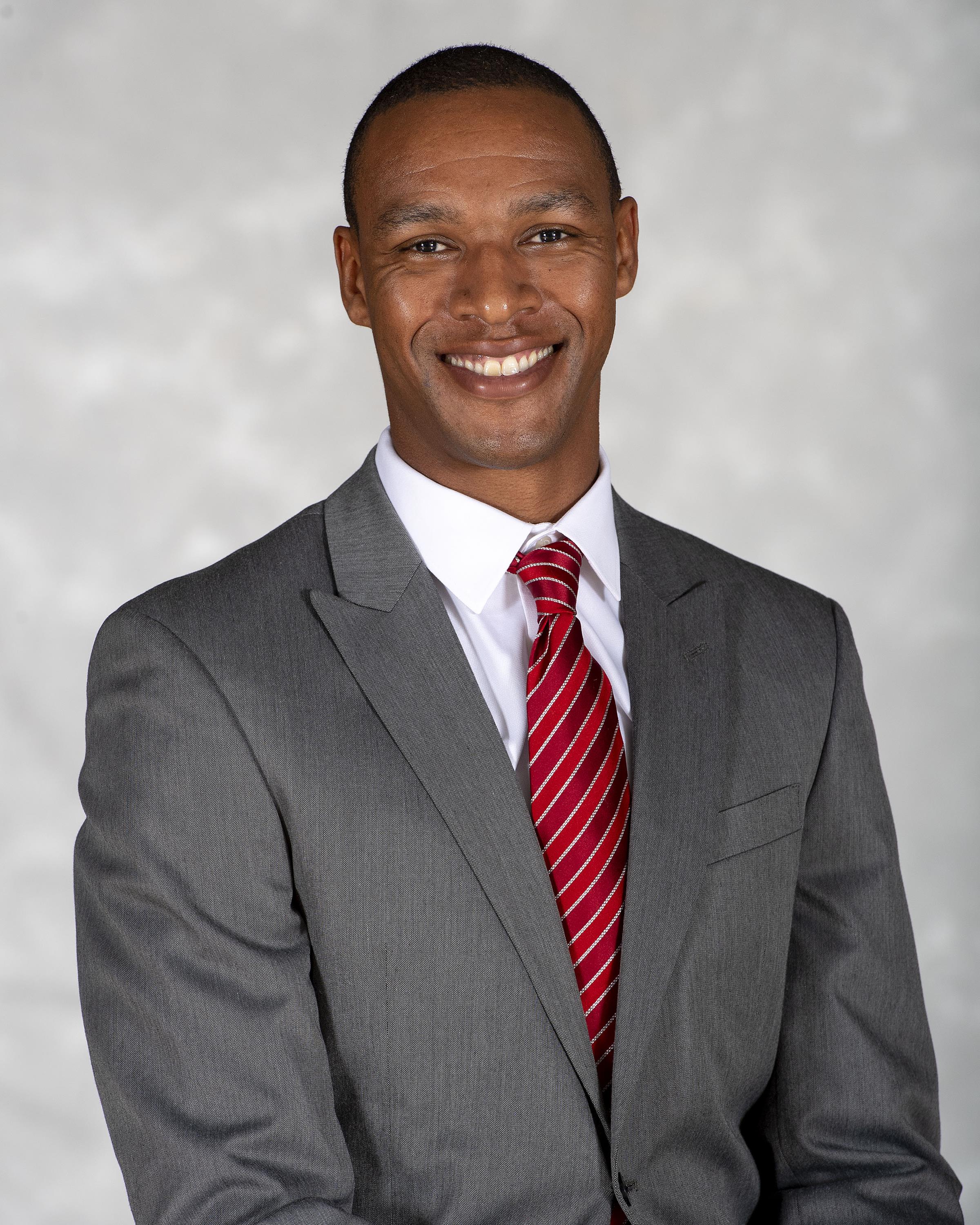 head shot of swimming & diving head coach Anthony Randall
