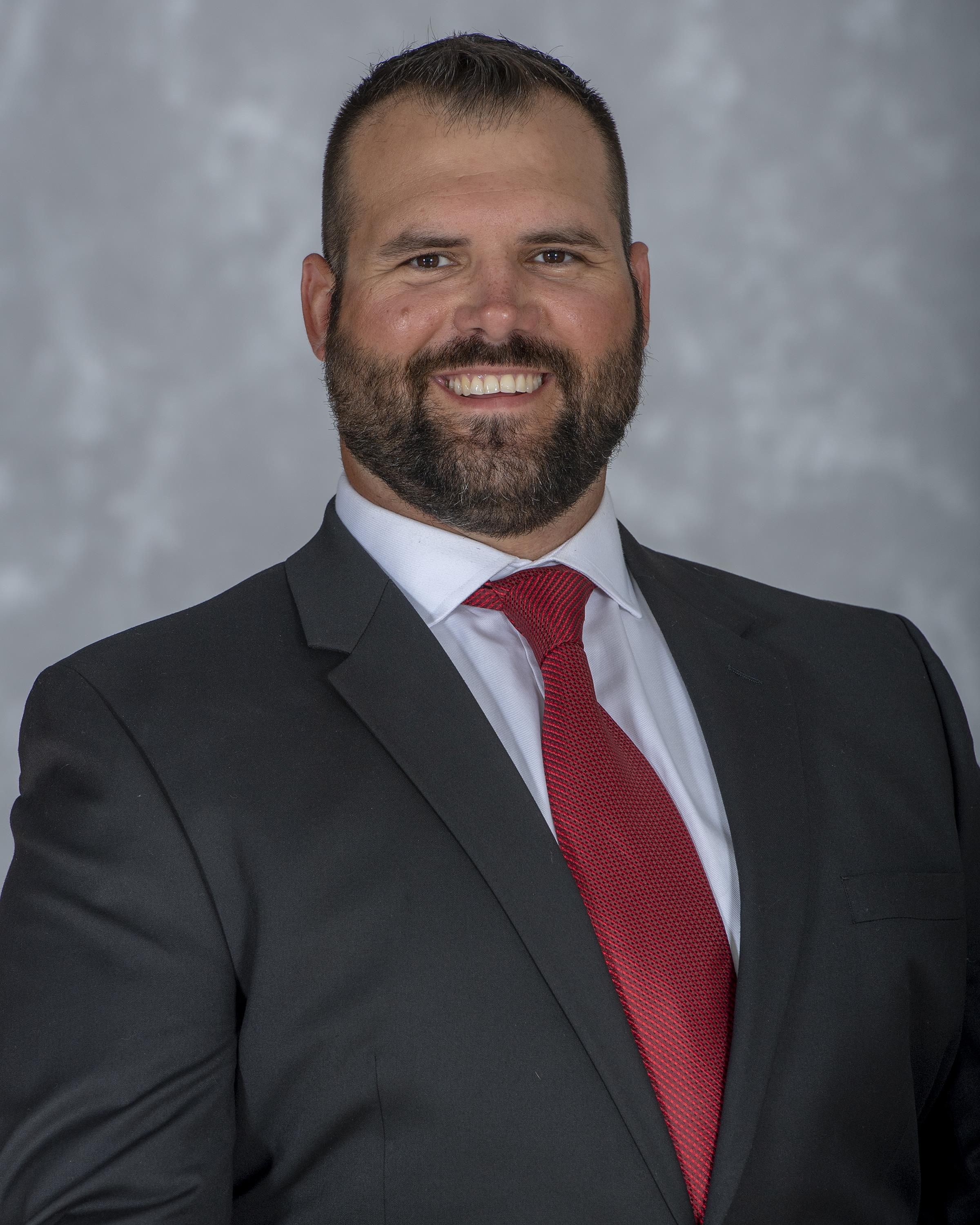 football assistant coach Jake Dembow head shot