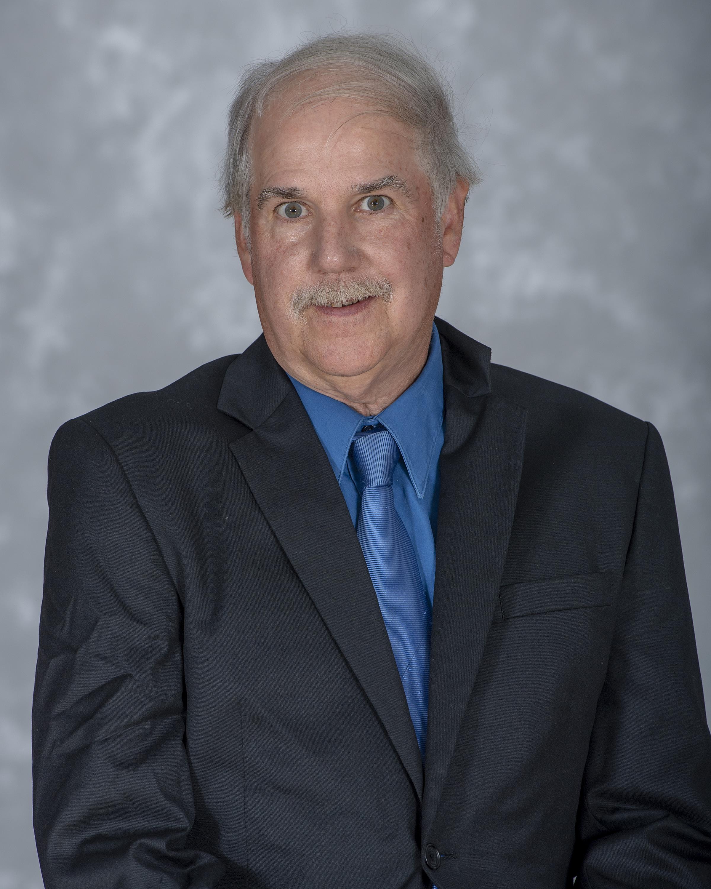 football assistant coach Tom Kelly - head shot
