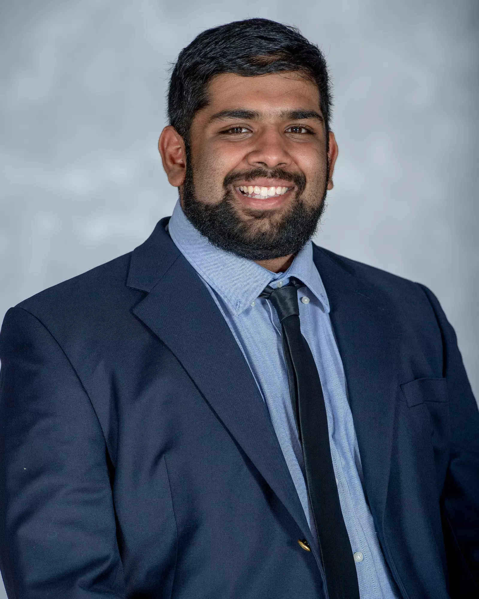 Dev Patel - football defensive assistant