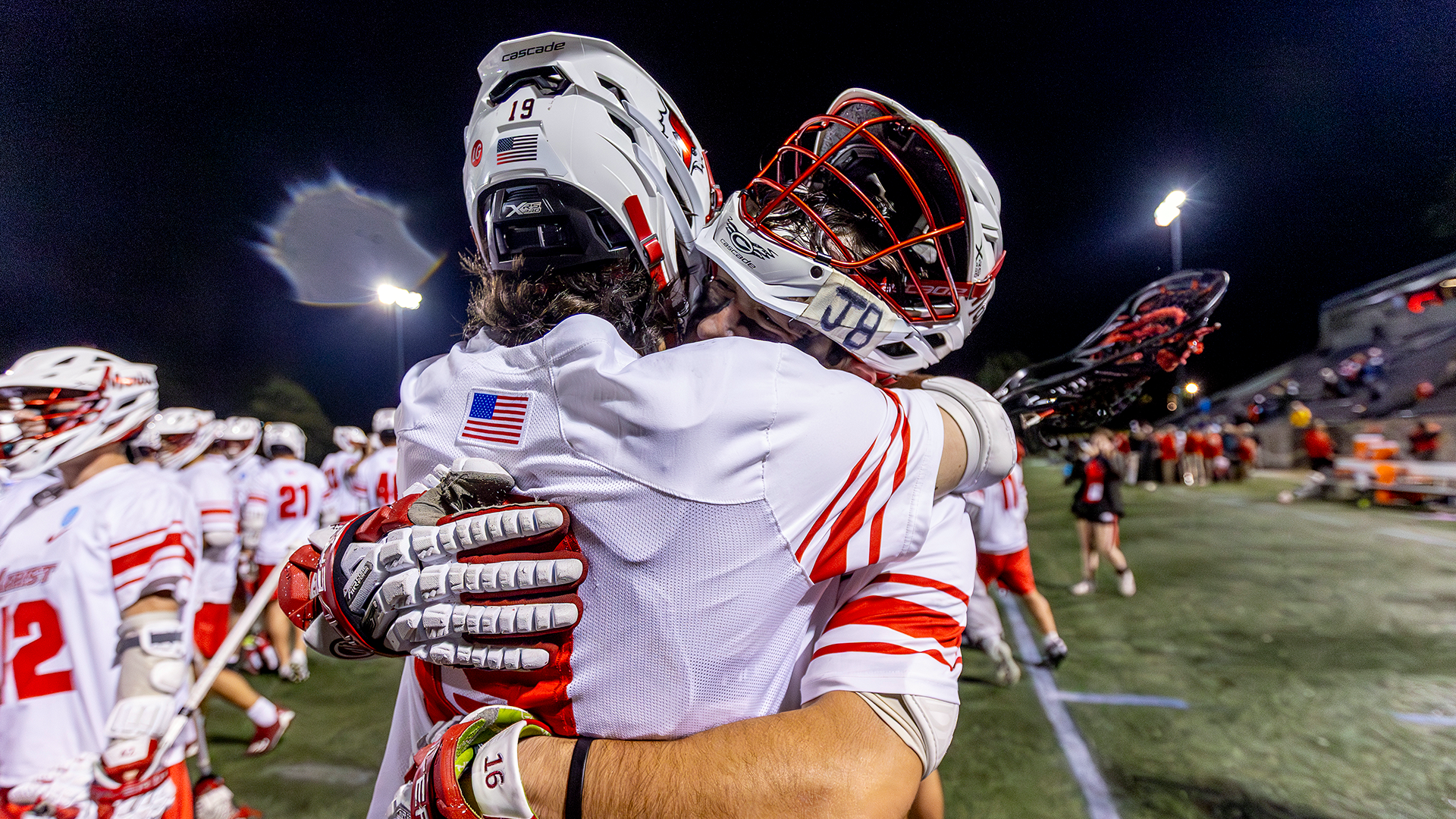 MLAX teammates hug following NCAA Tournament Victory