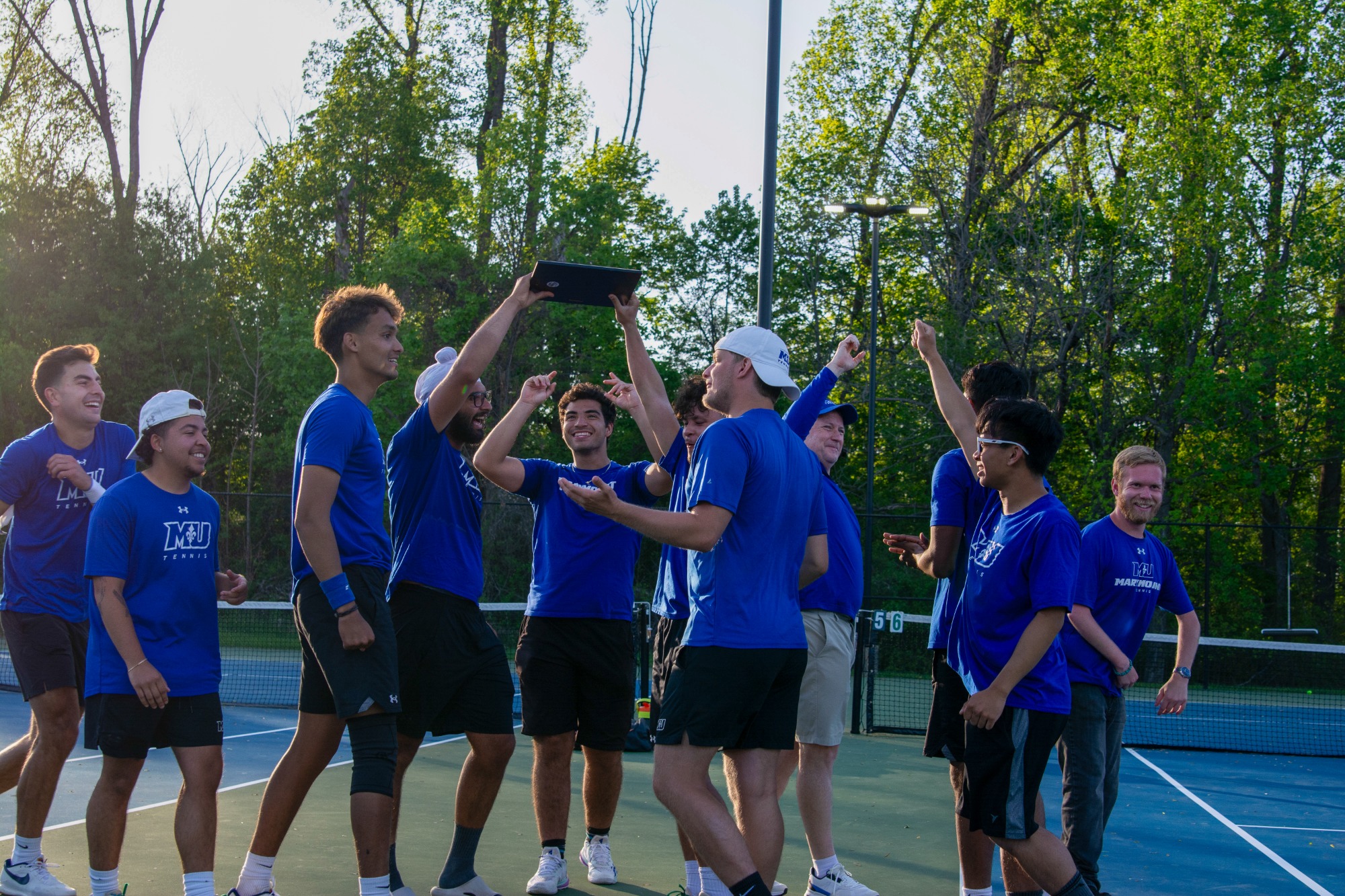 Men' Tennis vs. Neumann