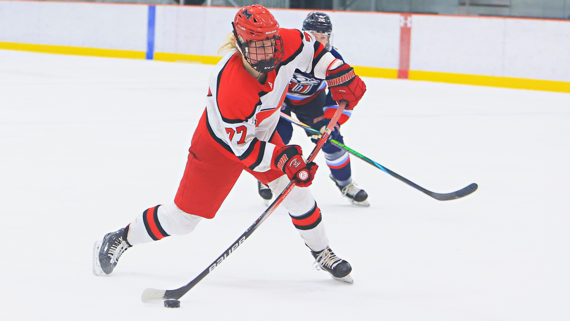 Brooklyn Adams plays the puck up the ice