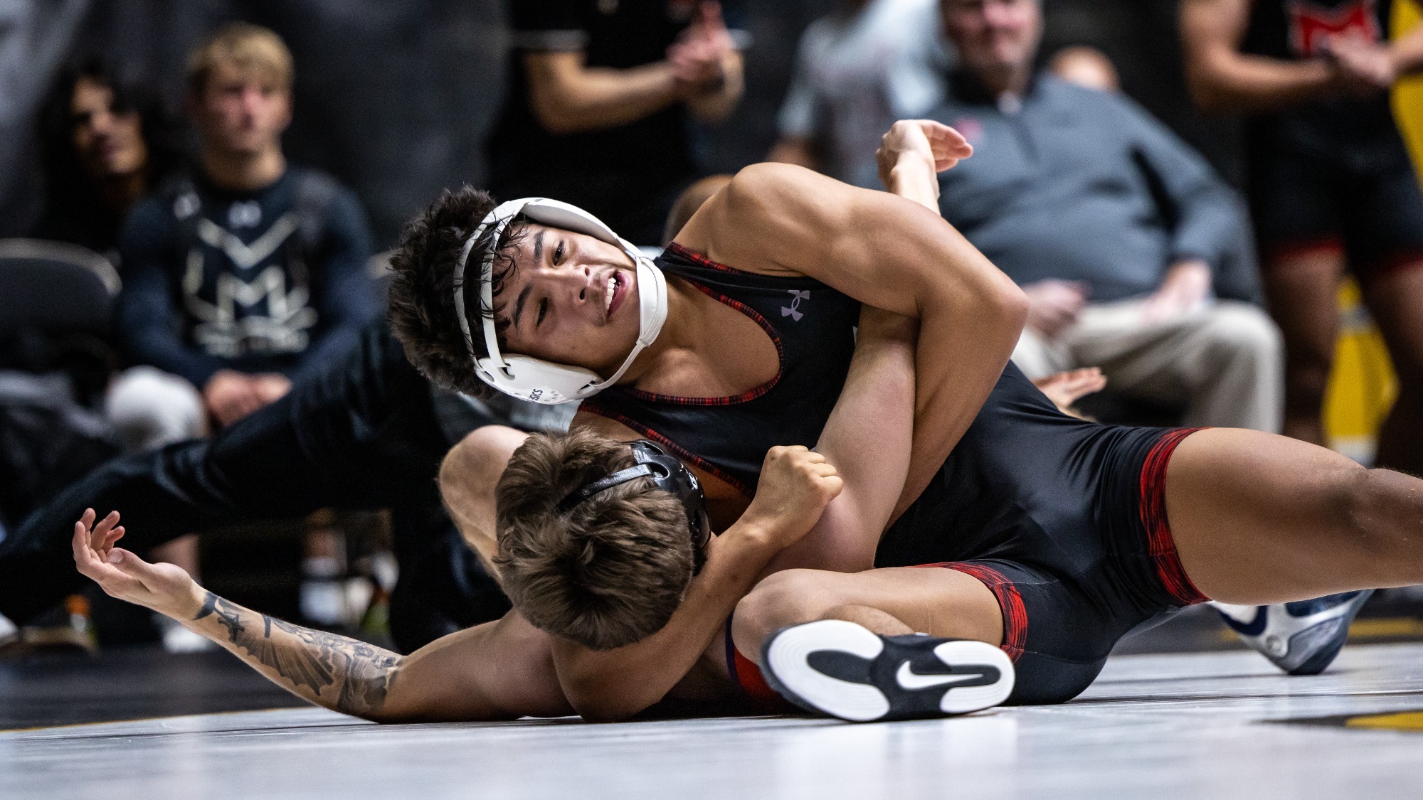 Nick Zamora hits a headlock