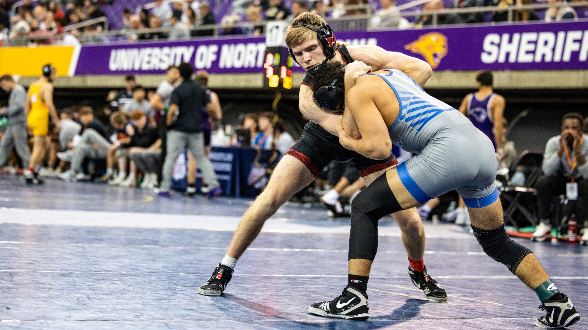 JP Homfeld wrestles at the UNI-Dome