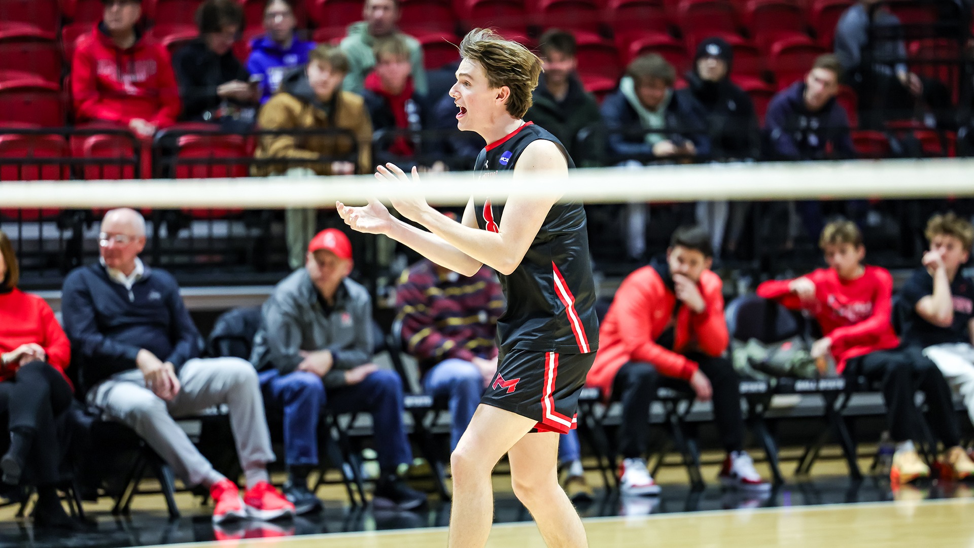 Jake Usher clapping at Ball State