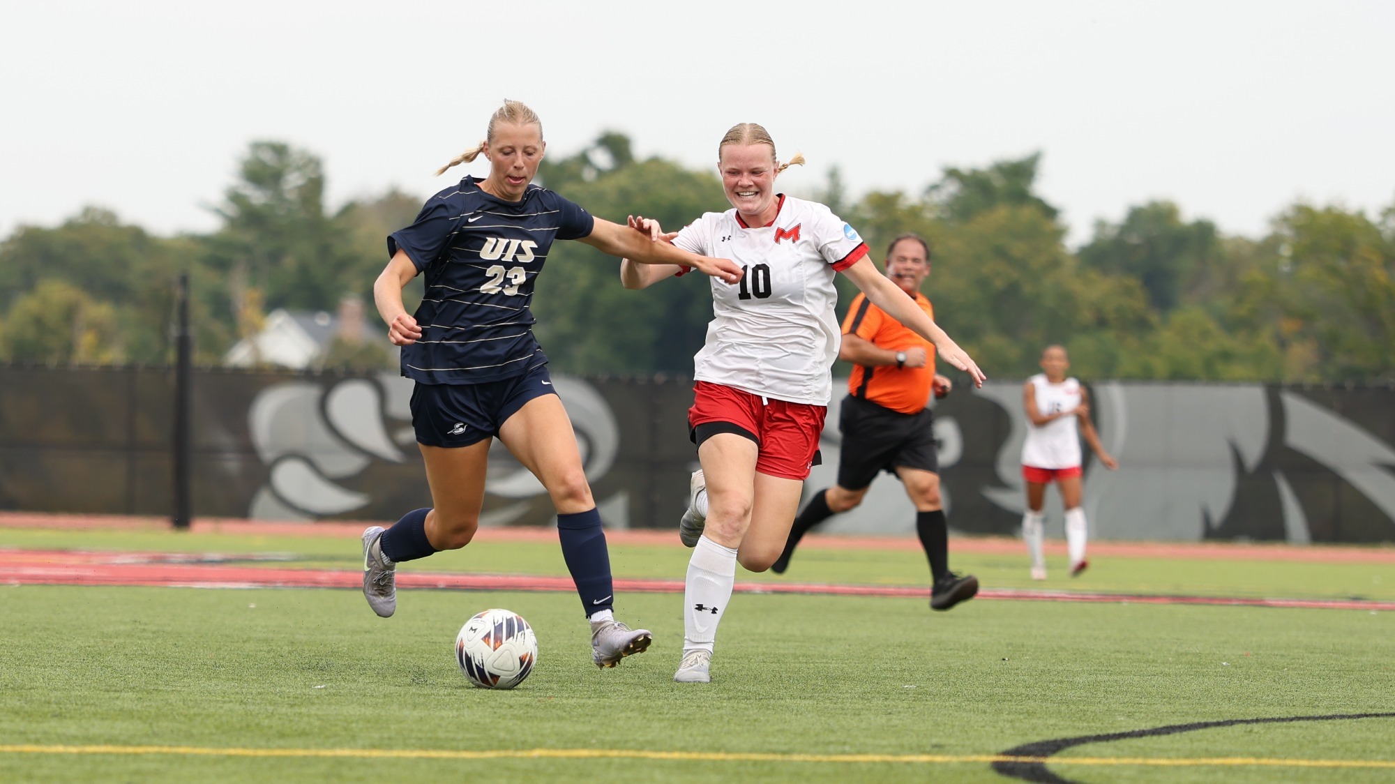 Karla Krebs fights for the ball against a defender