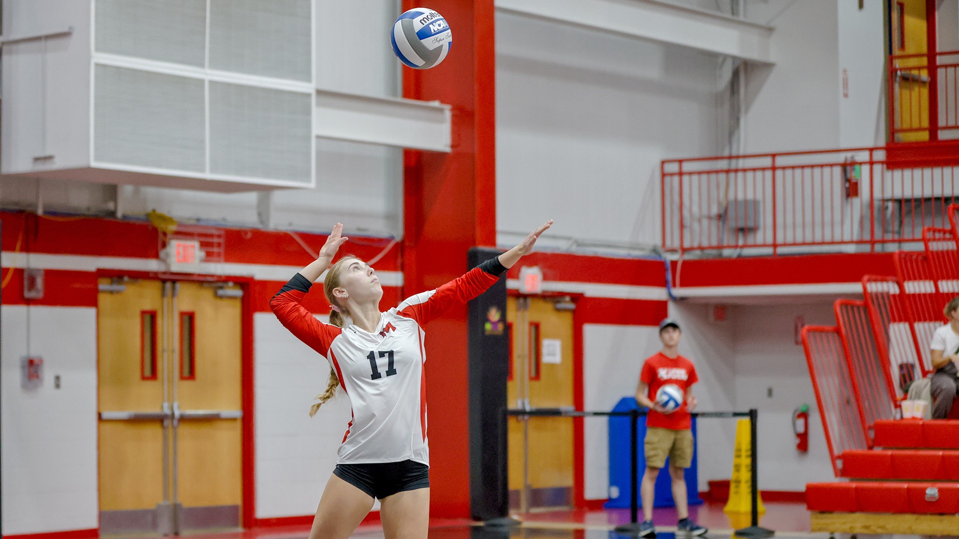 Hannah Patton serving at Lewis