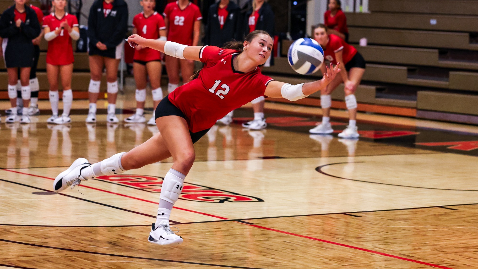 Emma Keele makes a diving dig against UMSL