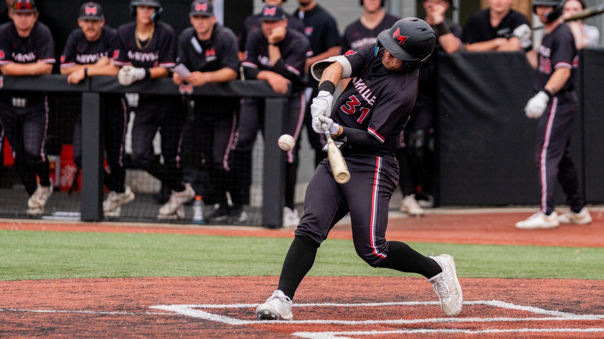Dominic Sharp hits the ball