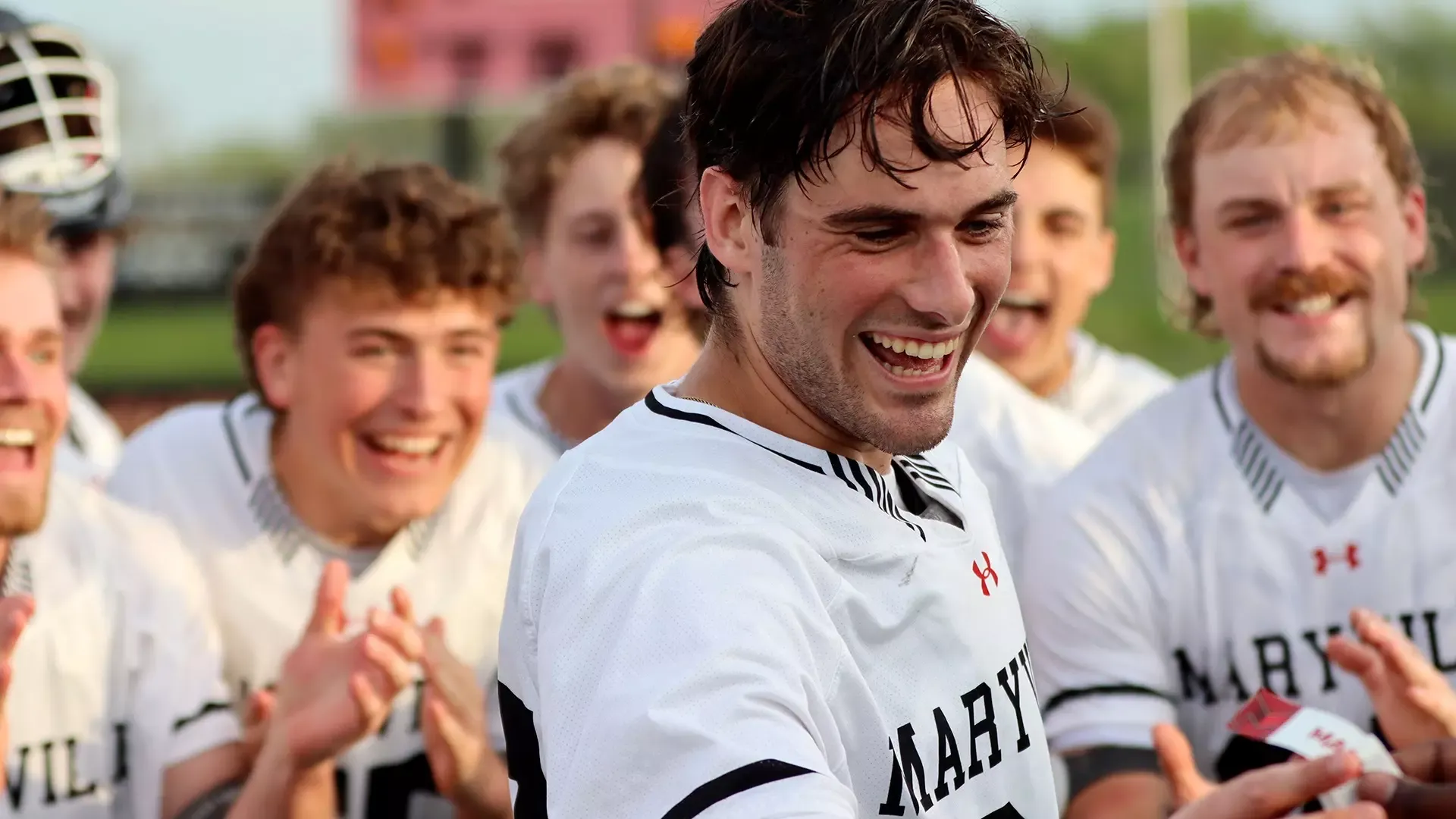 Griffin Johnson with GLVC sticker 2026 Tournament