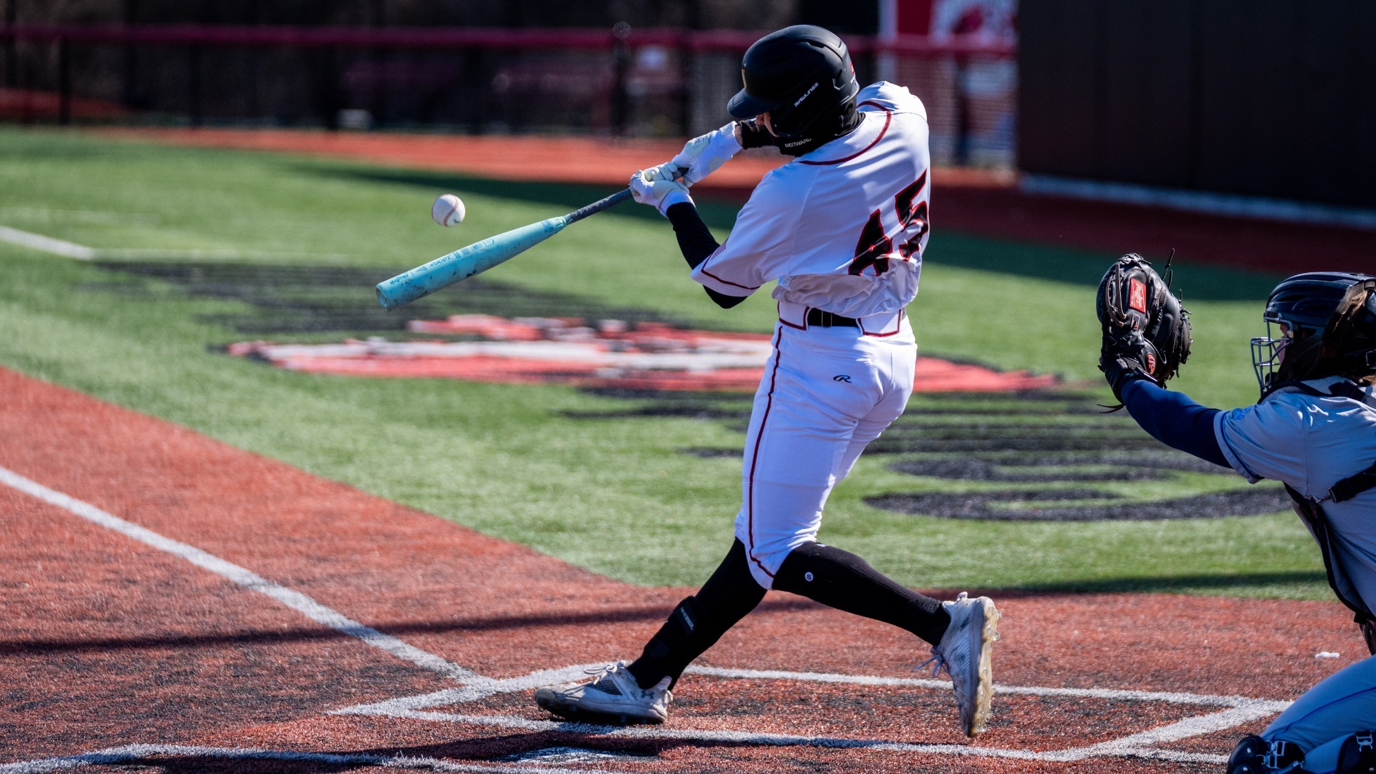 Matthew Rauser hits a ball