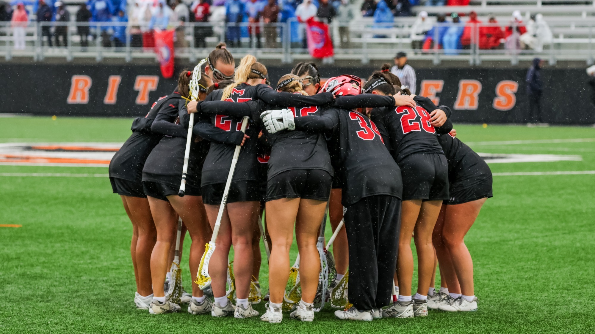 Women's Lacrosse Huddle at the National Championship