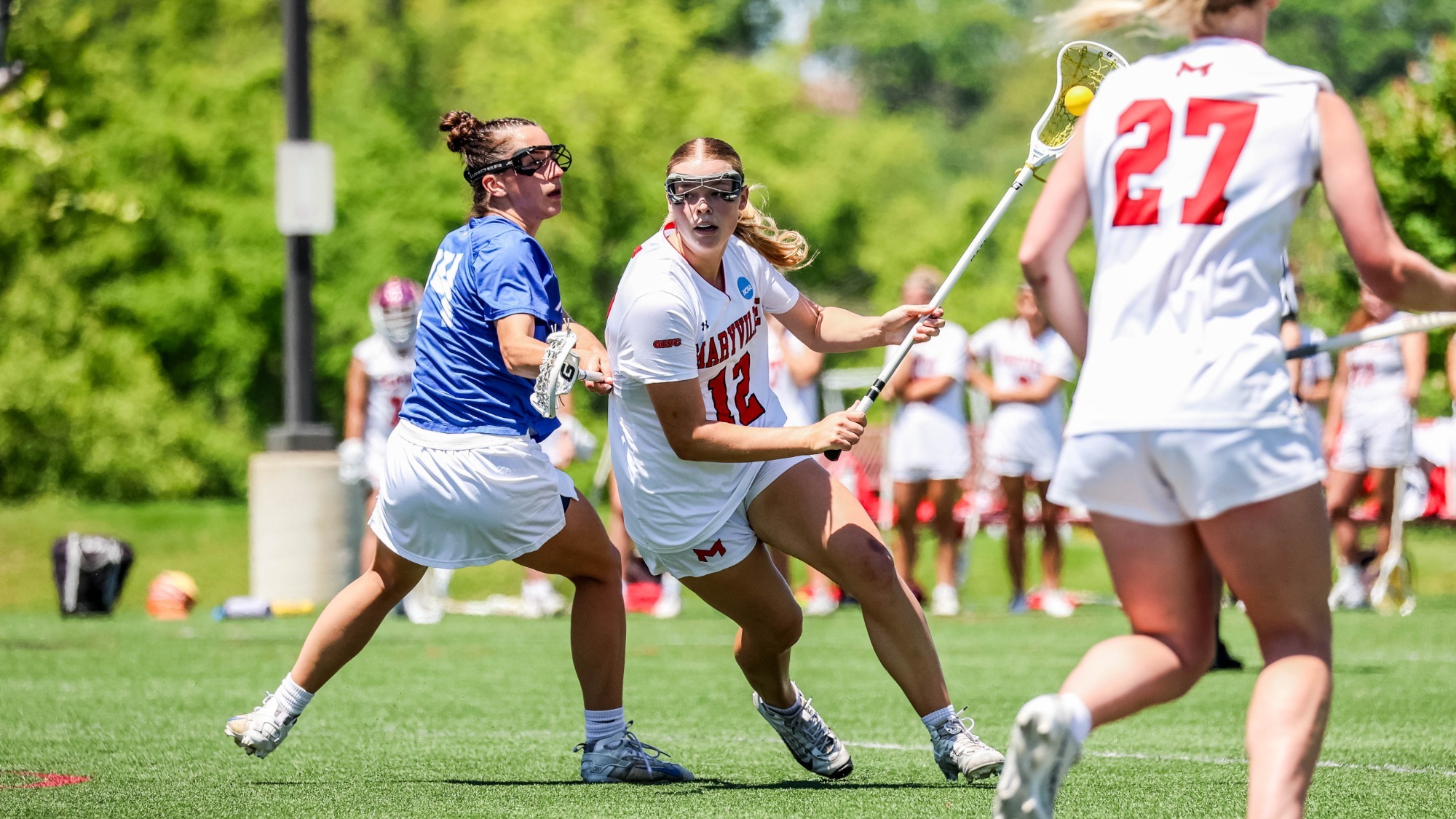 Paige Murphy fights past a defender