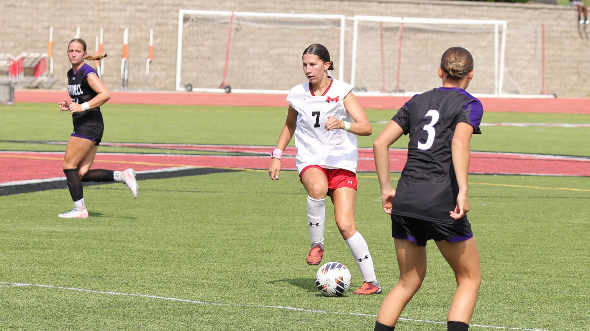 Hailey Scheuer moves the ball