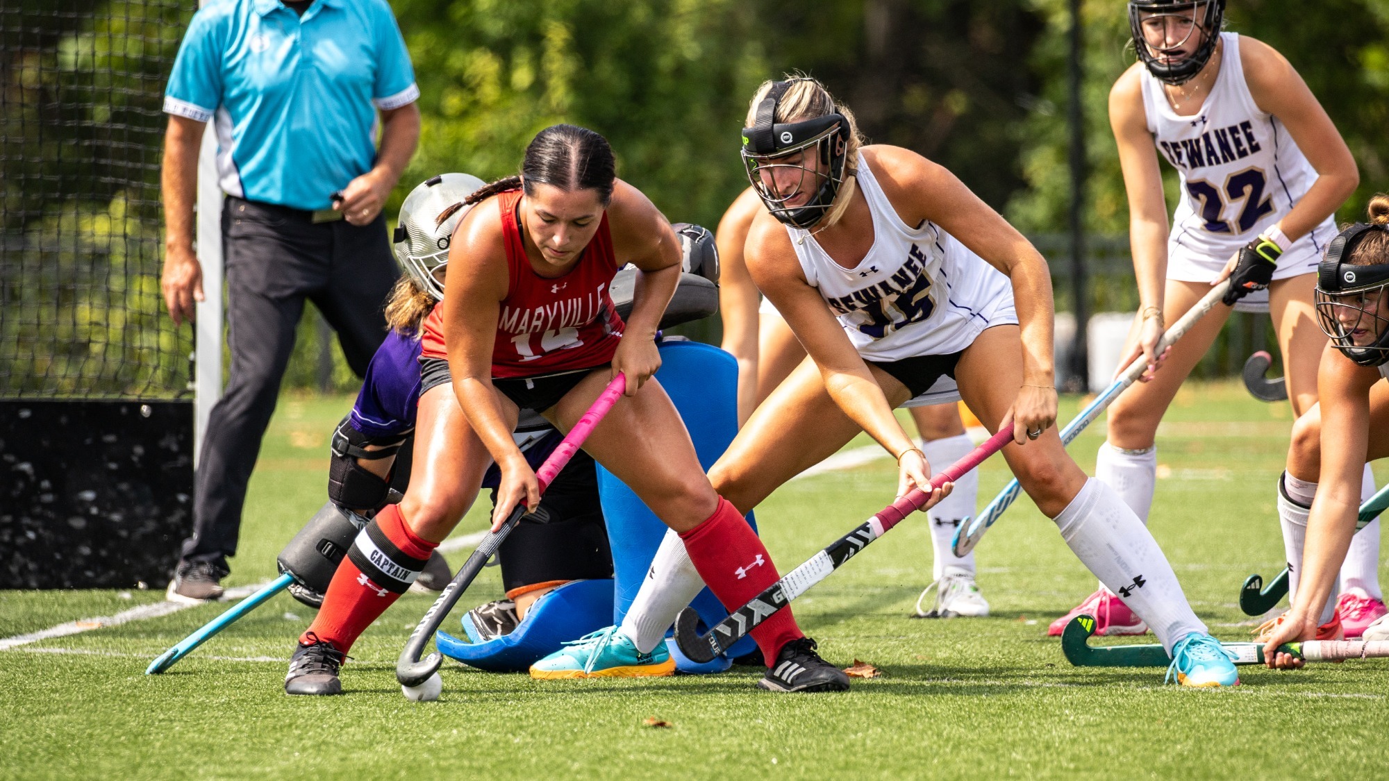Callista Crocker fights off several Sewanee defenders during a Maryville corner