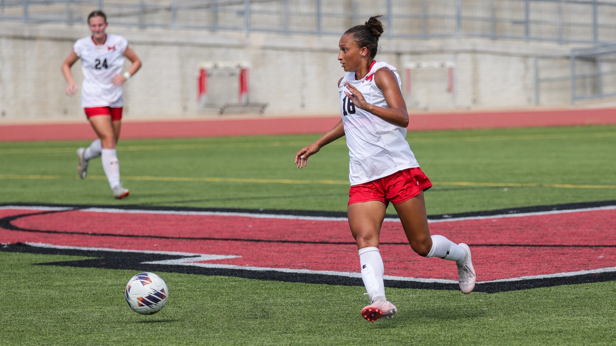 Gabby Tucker moves the ball in the midfield