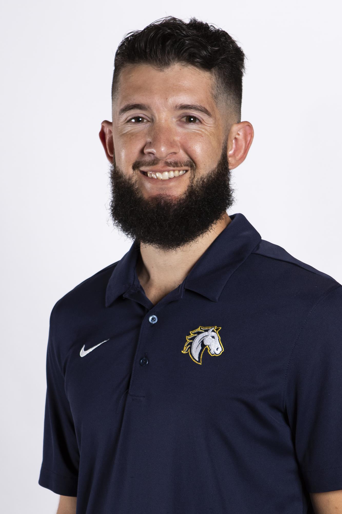 Armando Macias Women's Track and Field Coach The Master's