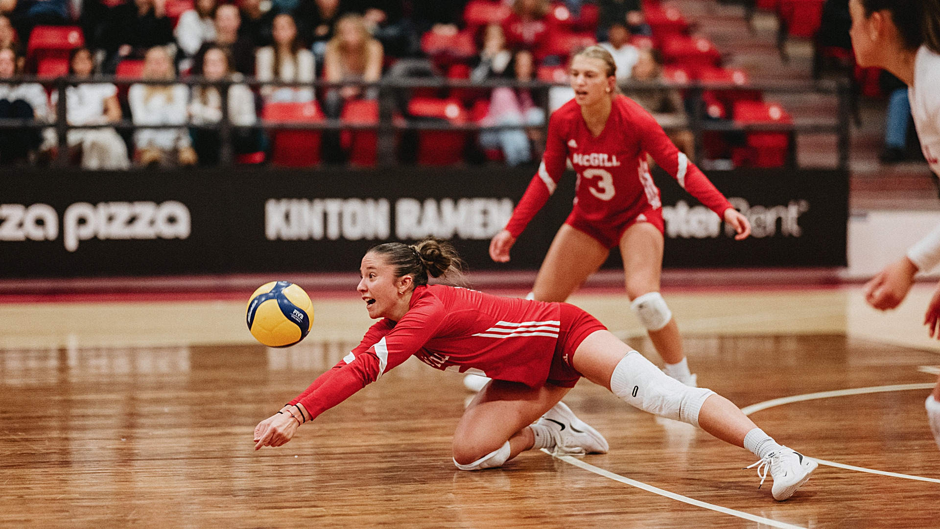 Middle blocker Emilia Grigorova (6) and power-hitter Emma Waskiewicz (3)