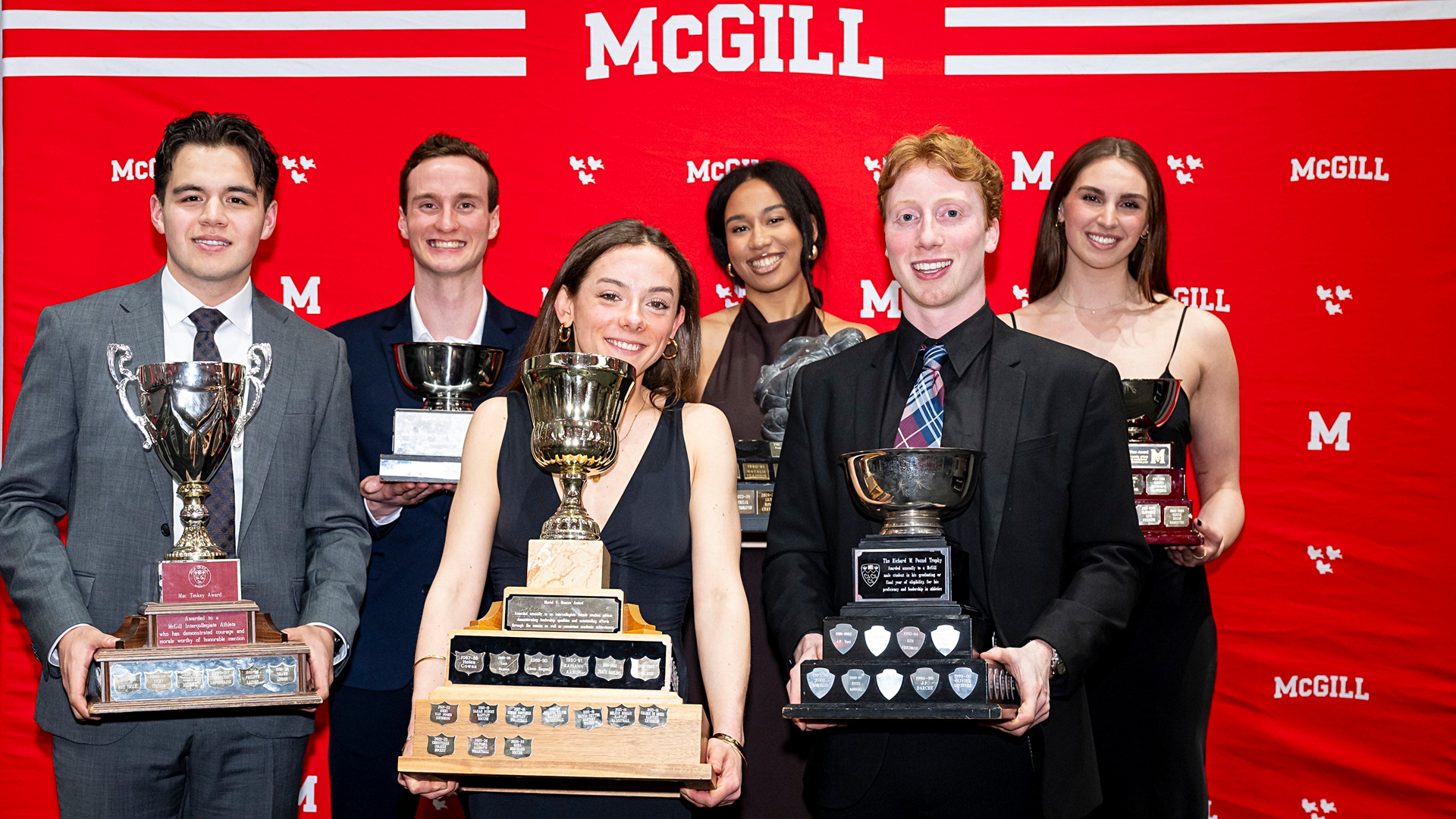 McGill athletics gala major award winners (L to R): hockey's Mikisiw Awashish, swimmers Loic Courville-Fortin and Iris Tinmouth, basketball's Emilia Diaz-Ruiz, and swimmers Erik Senseisen and Rebecca McGrath (ABSENT: football's Jerry Momo).  