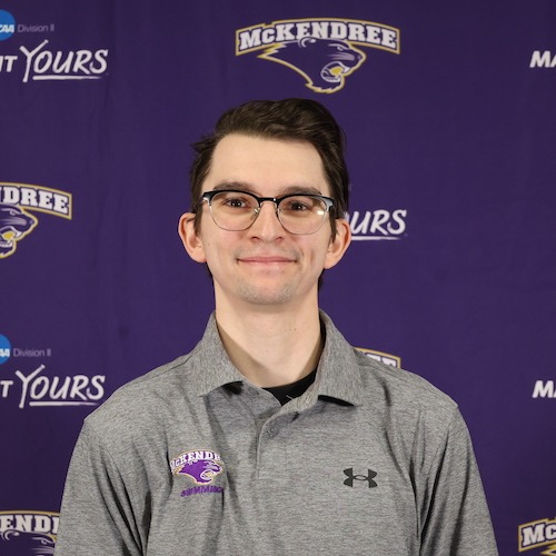 011224_swim_coach_oberg