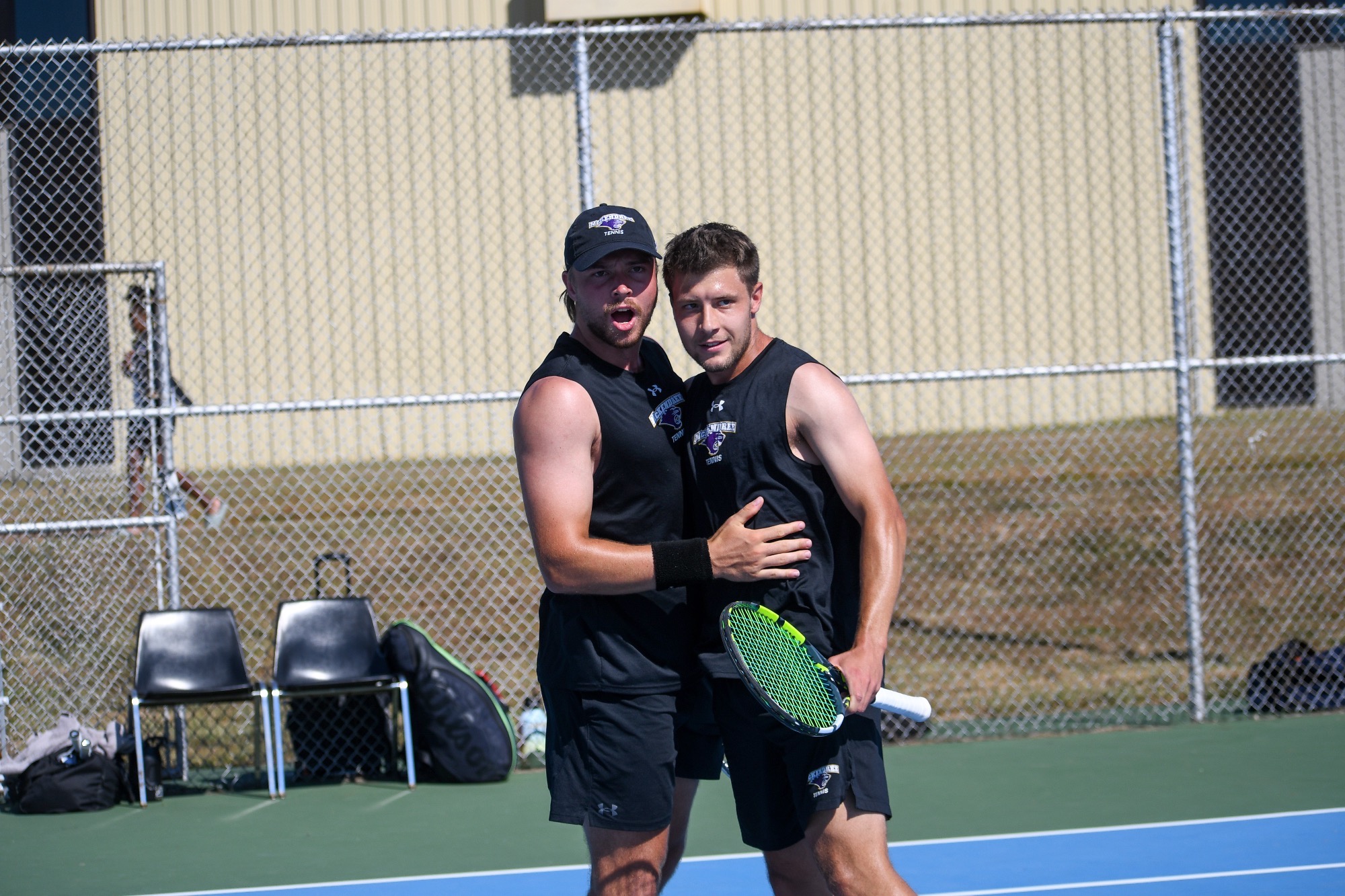 Doubles partners Schroeder and Kalenic celebrates win