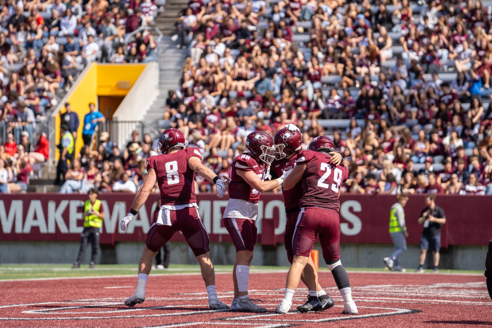 McMaster Football celebrates in the end zone