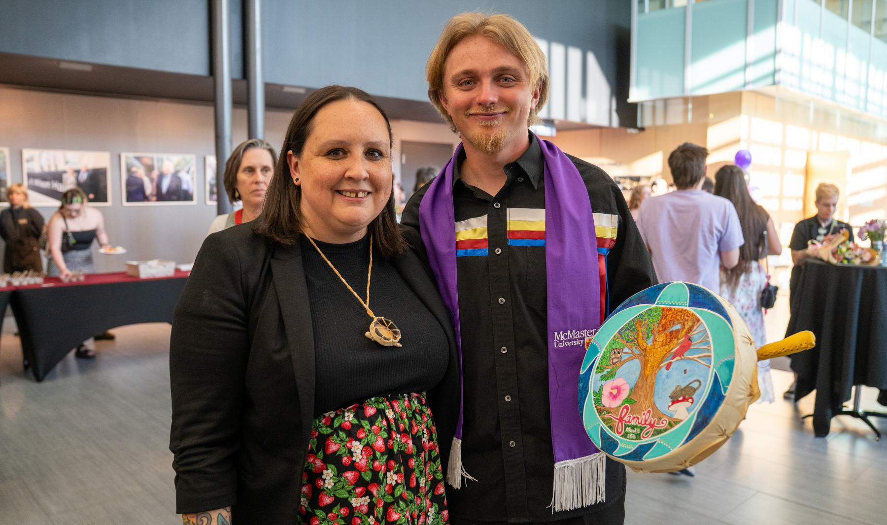 Seth Cabezas (right) and Chrissy Doolittle (left) pose for a photo during the Spring 2026 Indigenous Graduation ceremony at McMaster University