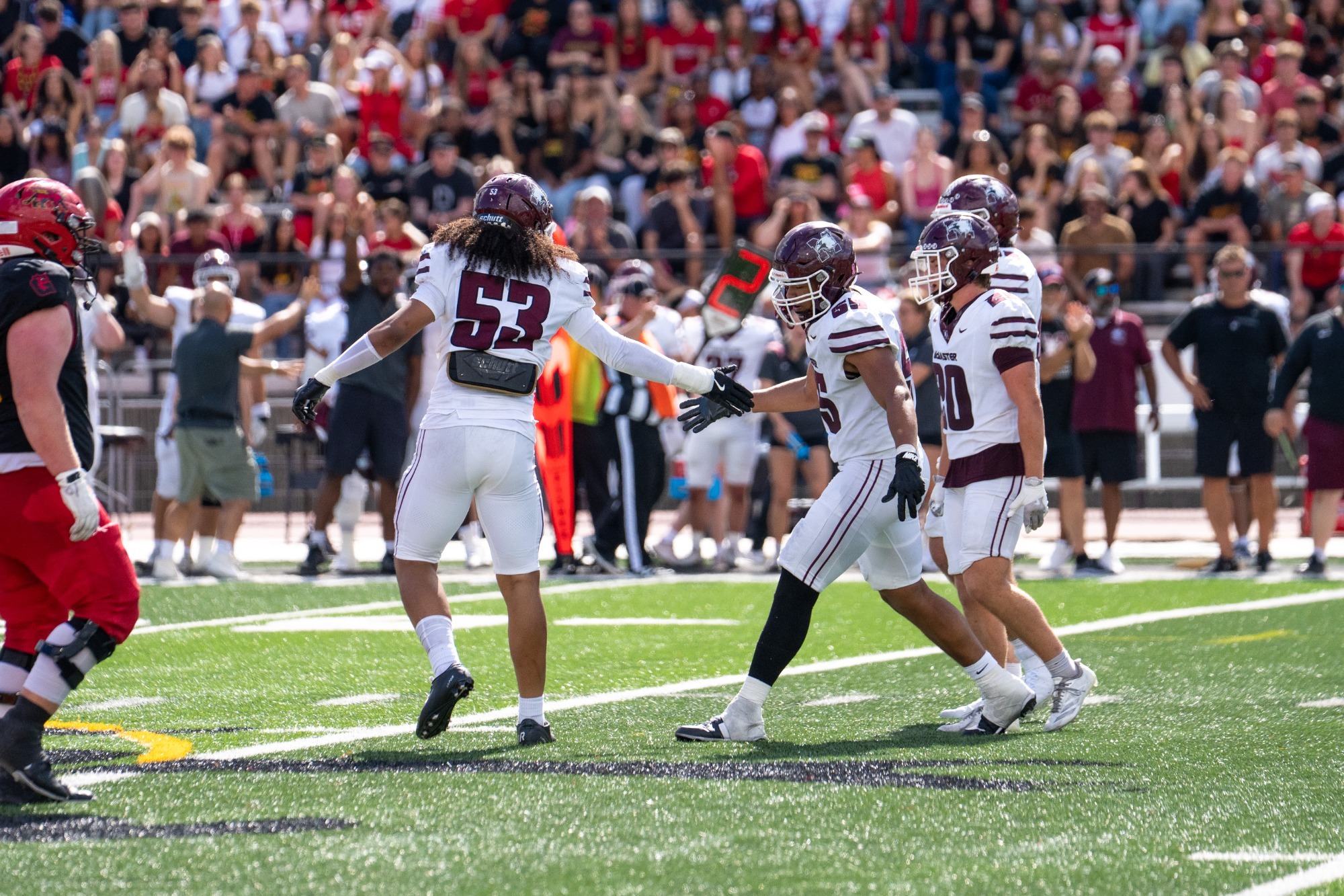 Ryan Broome (55) and Christian Chukwuali II (53) celebrate after a Broome sack on Guelph QB Tristan Aboud (Guelph, Ont. - September 6, 2026)