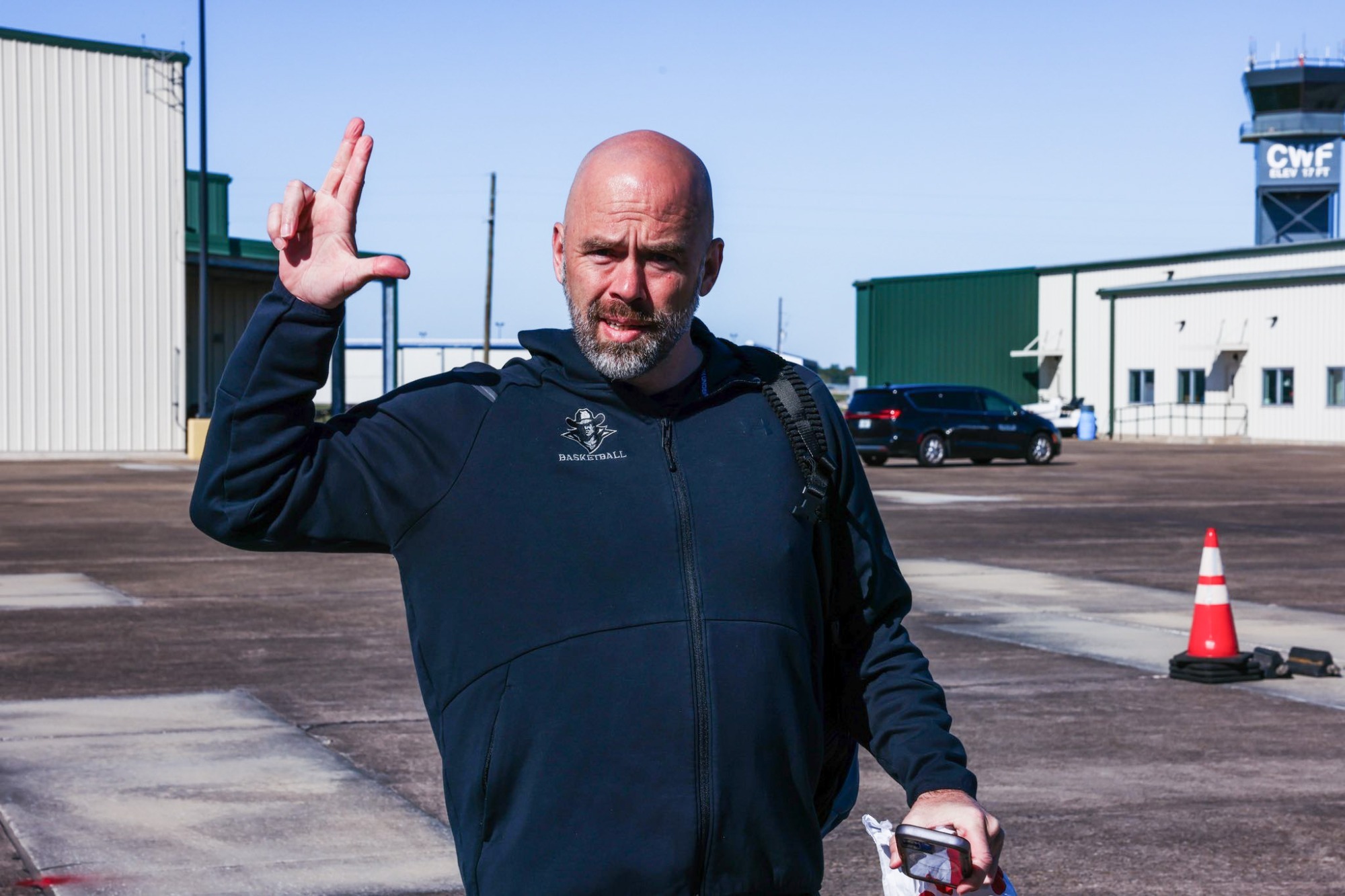 Coach Armstrong at airport