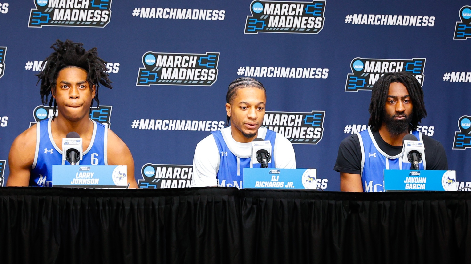 Players on NCAA dais