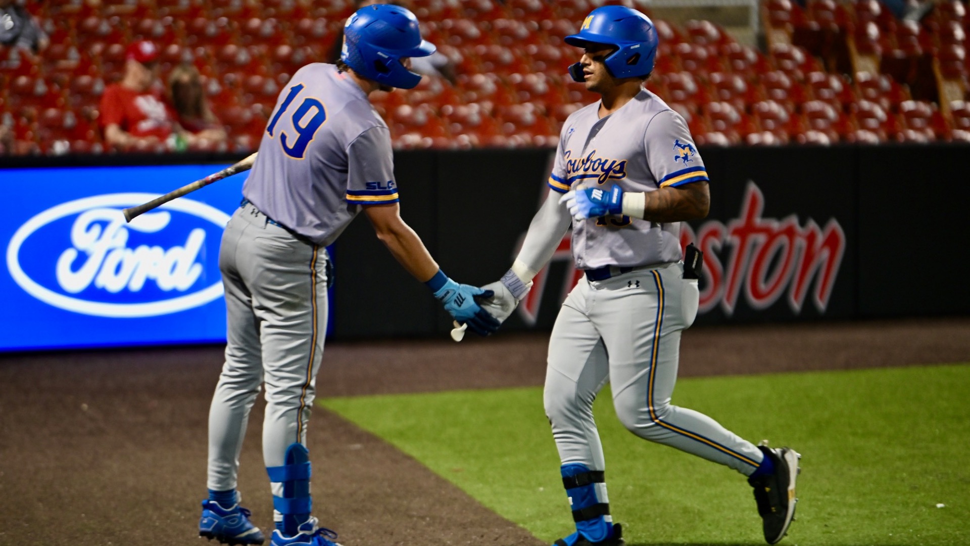 Keller and Marcus high five