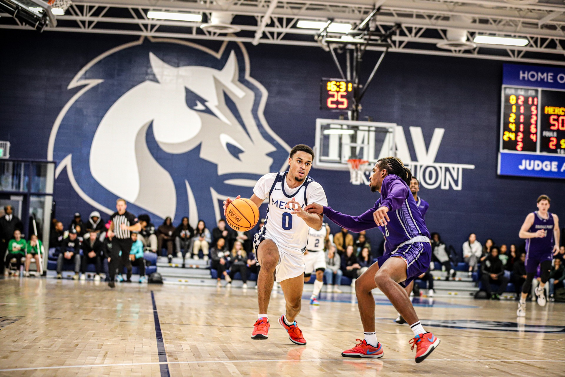 May Scores TeamHigh 20 Points as Men's Basketball Hosts Daemen Mercy