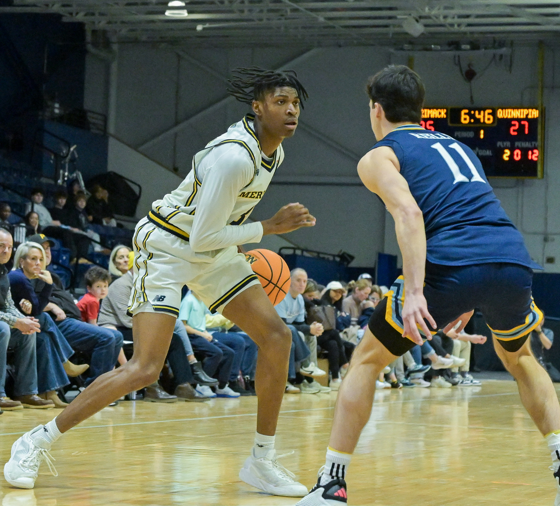 Men's Basketball Tops Quinnipiac